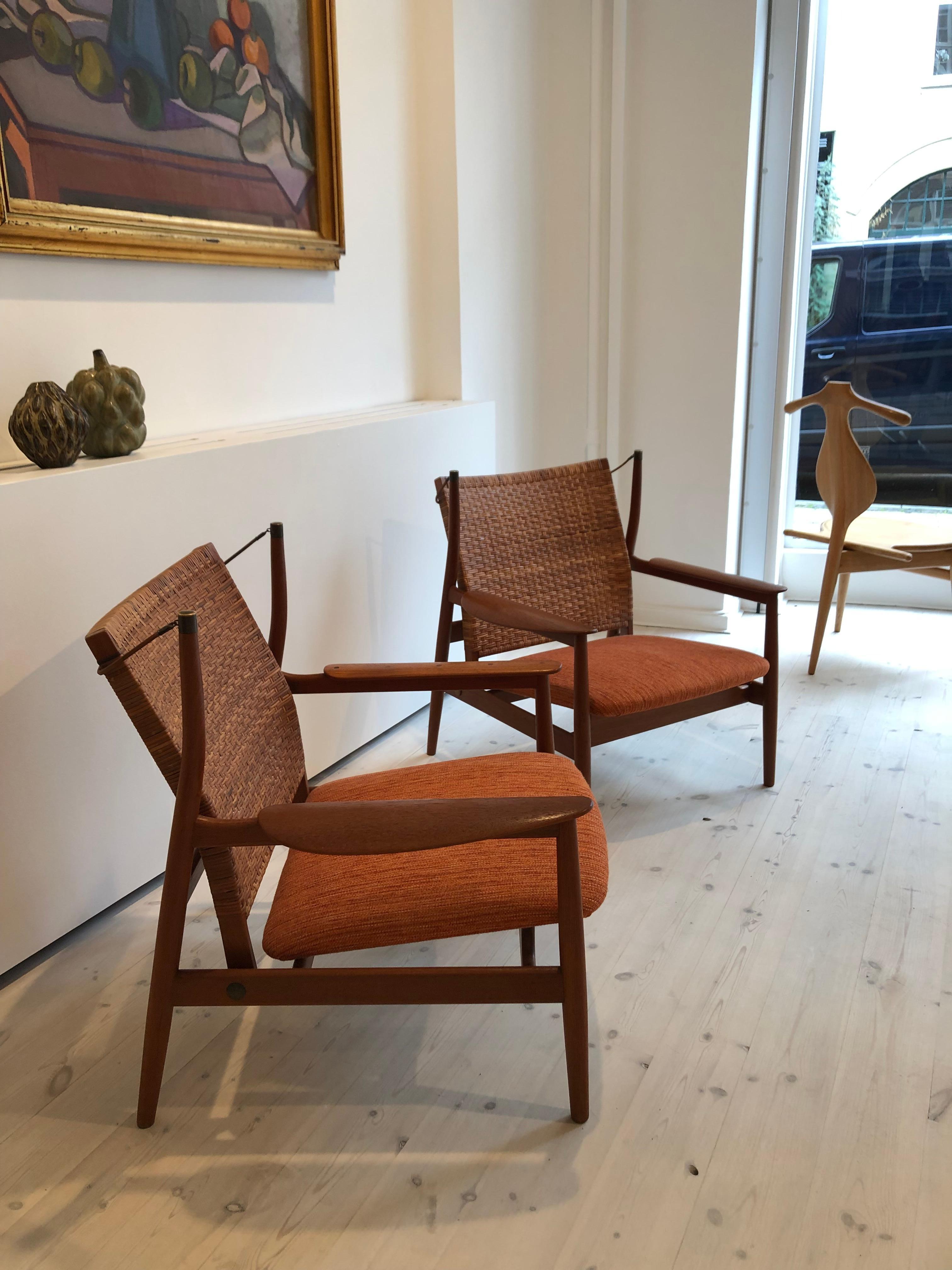 Finn Juhl Rare Pair of NV55 Armchairs in Teak and Cane for Niels Vodder, 1955 In Excellent Condition In Copenhagen, DK