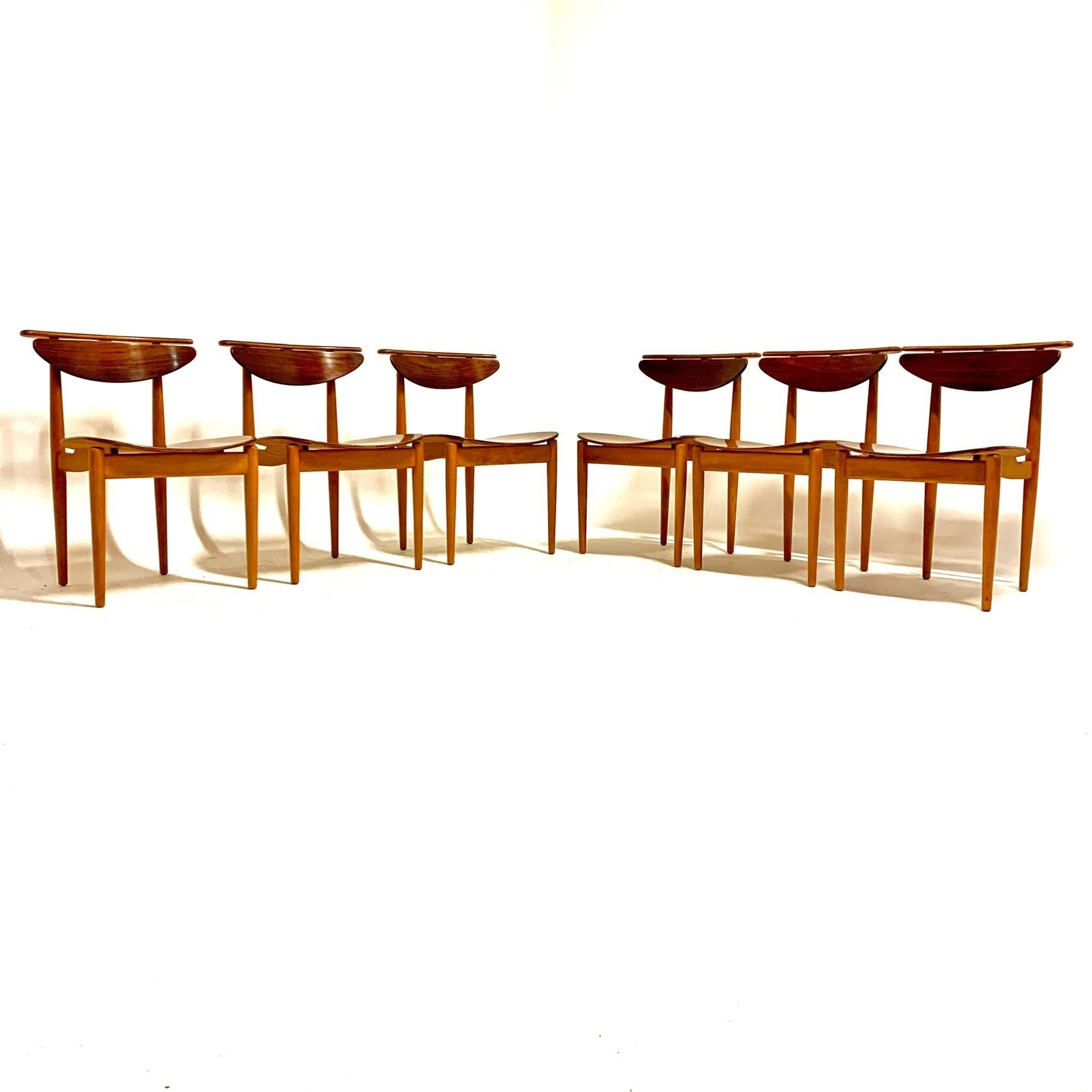 6 rosewood/ beech BO 62 chairs. This model was presented at the exhibition “Købestævnet” in Fredericia, 1953. The chair was awarded the gold medal at the 10th Triennale in Milan, 1954. This very rare version of the BO62 chair by Finn Juhl veneered
