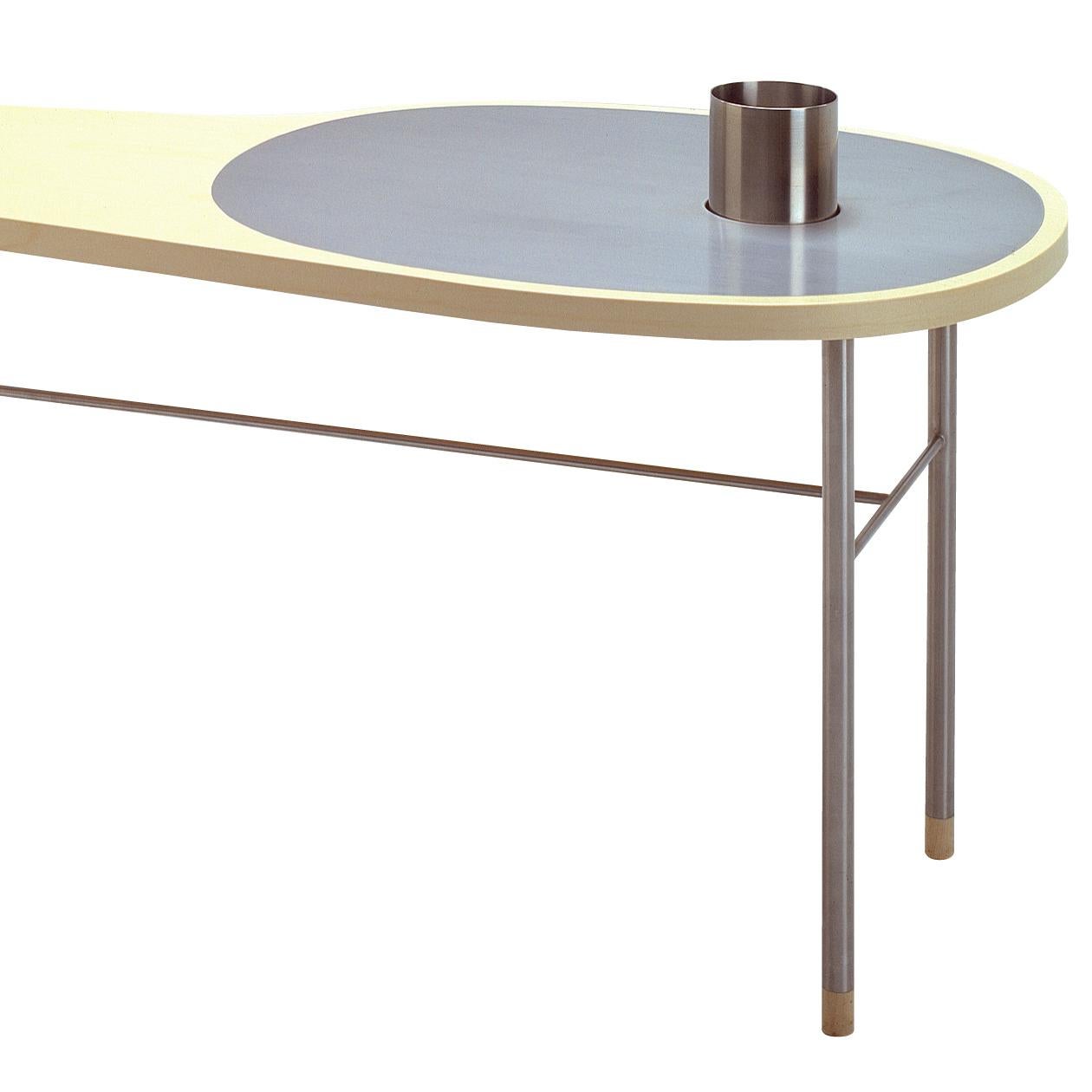 Table designed by Finn Juhl in 1948, relaunched in 2000.
Manufactured by House of Finn Juhl in Denmark.

A large share of Finn Juhl’s designs were commissioned assignments - often as part of his business as a renowned interior designer. The Ross