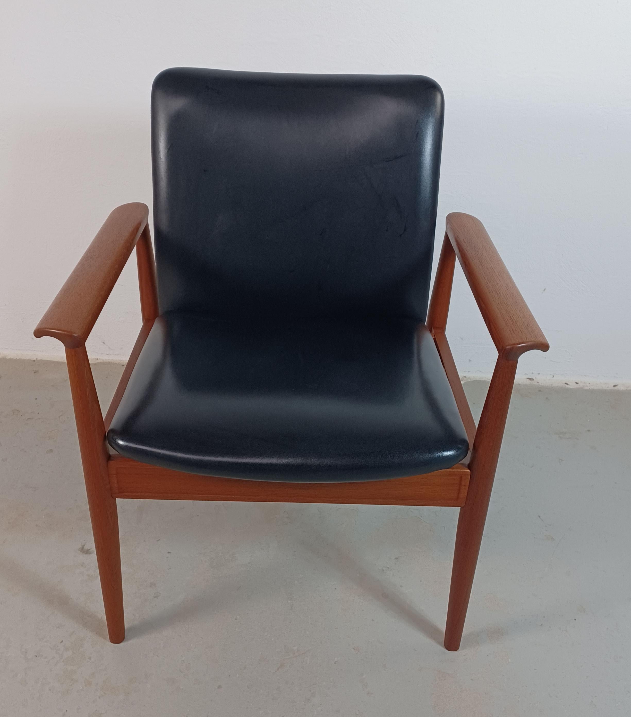 Finn Juhl set of two fully restored armchairs including custom upholstery 

The chairs were designed in 1963 for France and Son that later changed their name to Cado as part of an office funiture series named 