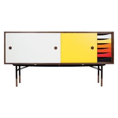 Finn Juhl Sideboard in Wood and Warm Colors with a Tray Unit