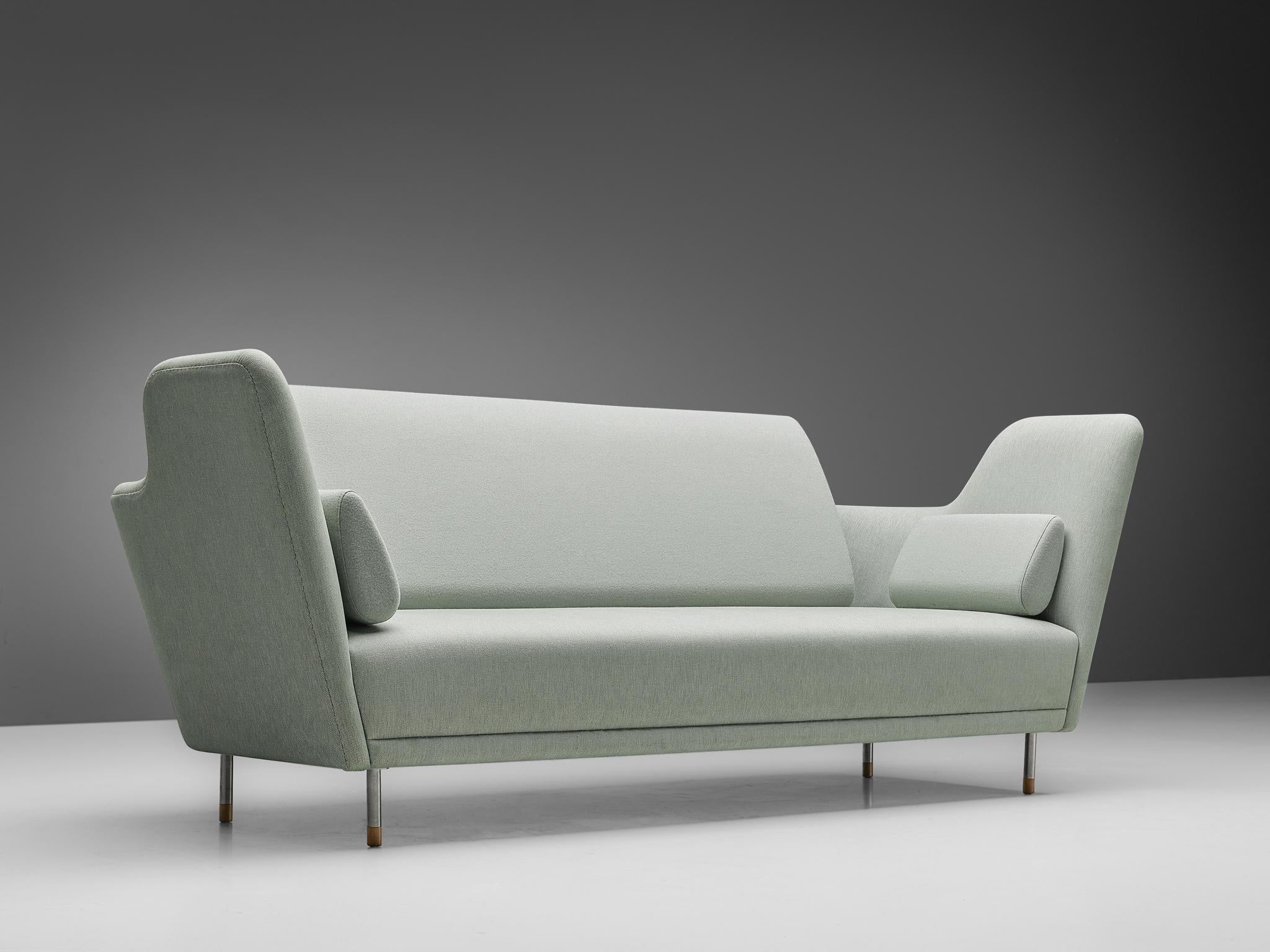 Finn Juhl, sofa model '57', fabric, steel, teak, leather, Denmark, design 1957, later production

An extraordinary sofa designed by Finn Juhl. The sofa was exhibited for the very first time in the Tivoli Gardens in Copenhagen during 1957. The