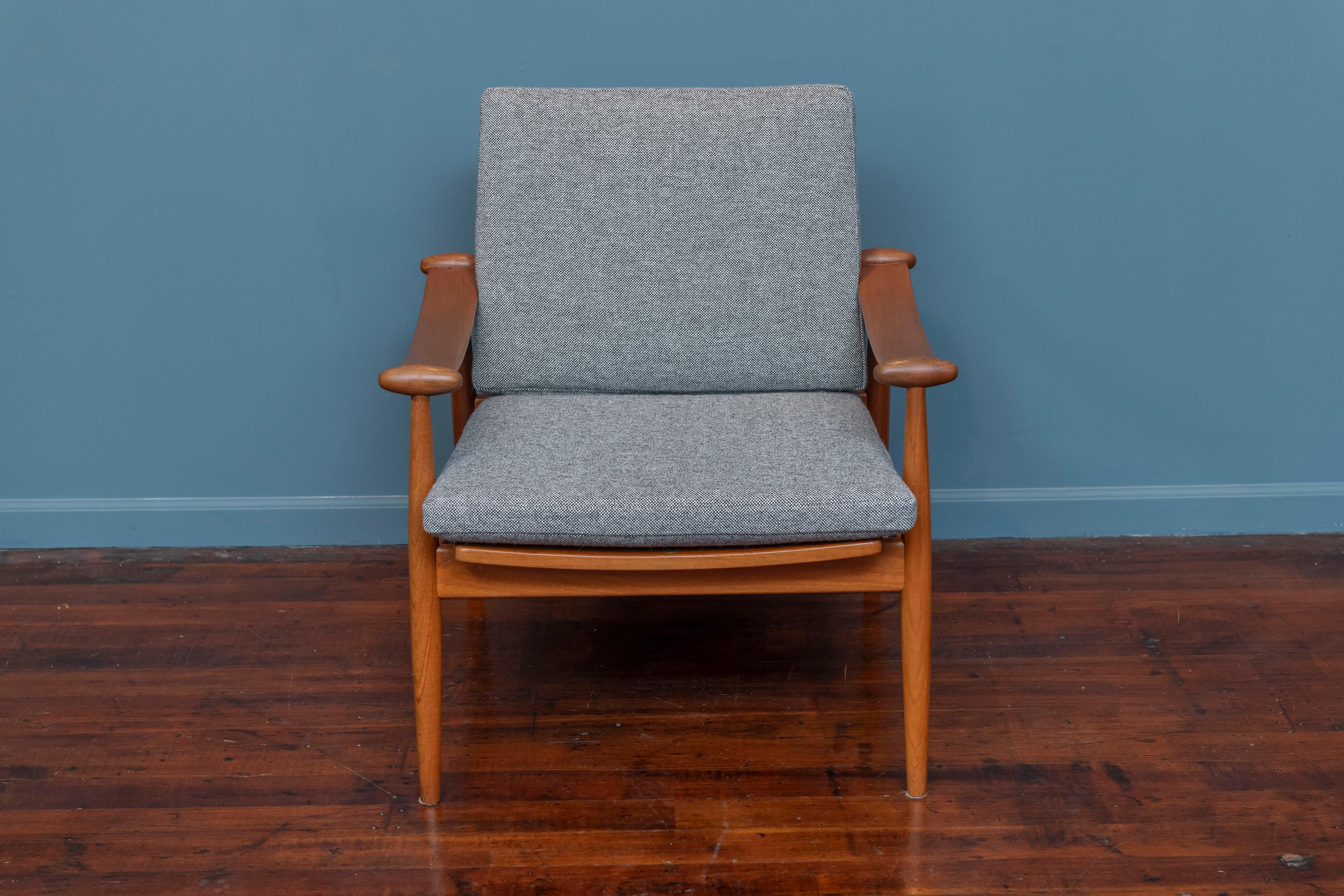 Finn Juhl design spade chair model 133 for France & Daverkosen, Denmark. Newly refinished teak frame with new cushions upholstered in Danish wool.