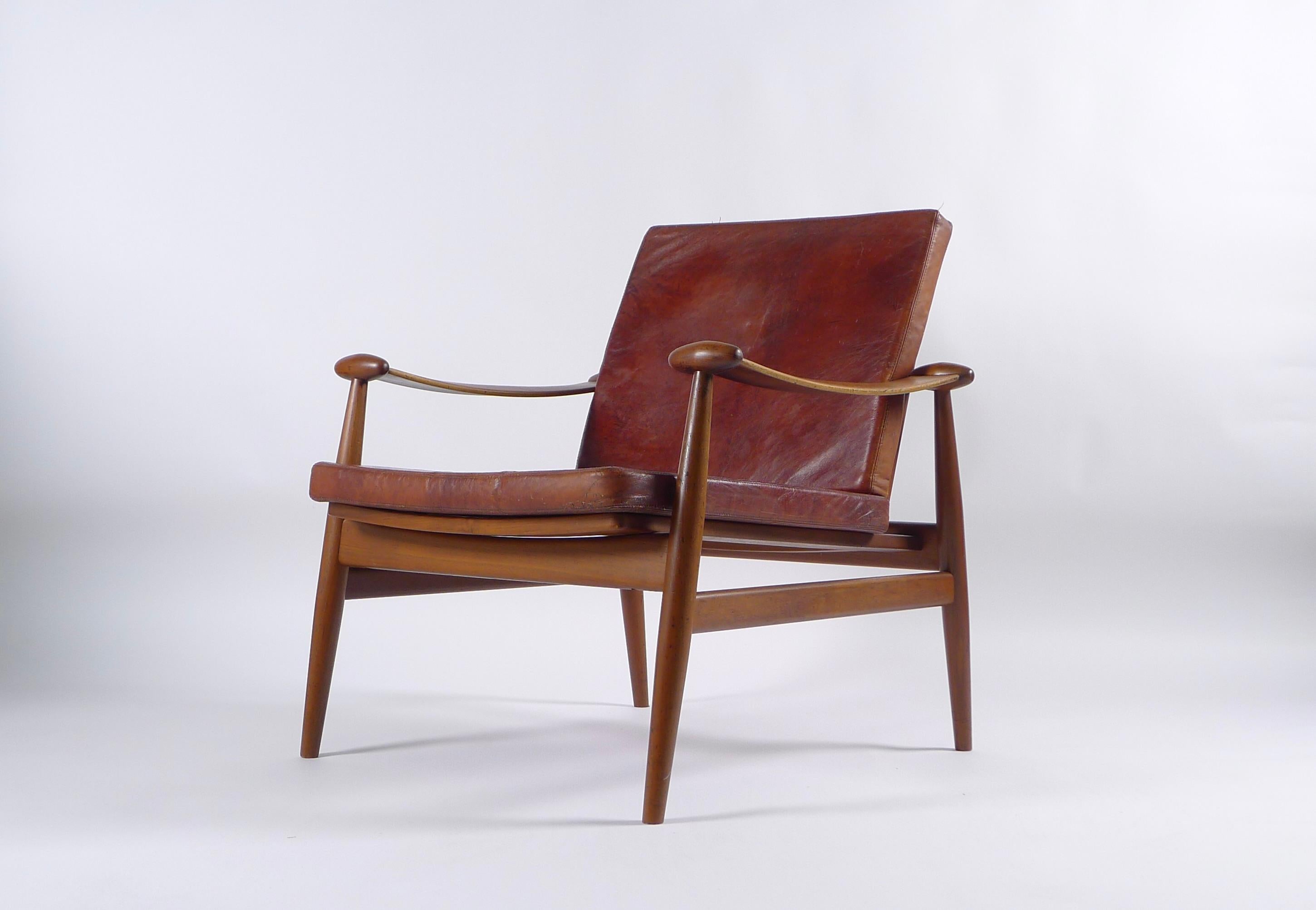 Spade lounge chair, or 'Spadestolen', model FD133, designed by Finn Juhl in 1953 and manufactured by France & Son in the 1950s. Teak framed with removable leather cushions. France & Son label

The cushions are in the original leather and are