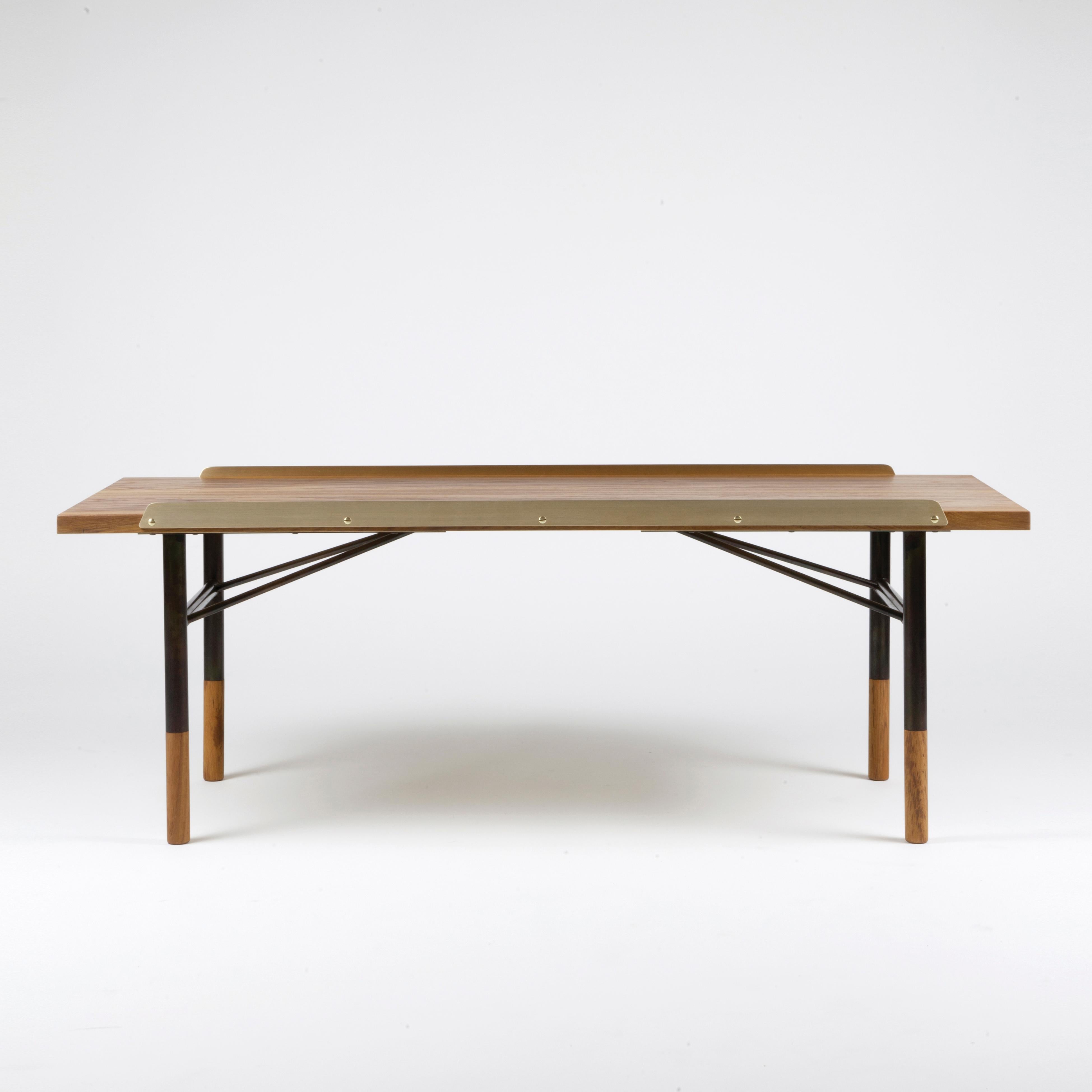 Table Bench designed by Finn Jhul
Manufactured by One collection Finn Juhl (Denmark)

Finn Juhl experienced an international breakthrough in the USA during the early 1950s. He subsequently designed a range of furniture with steel pipe frames,