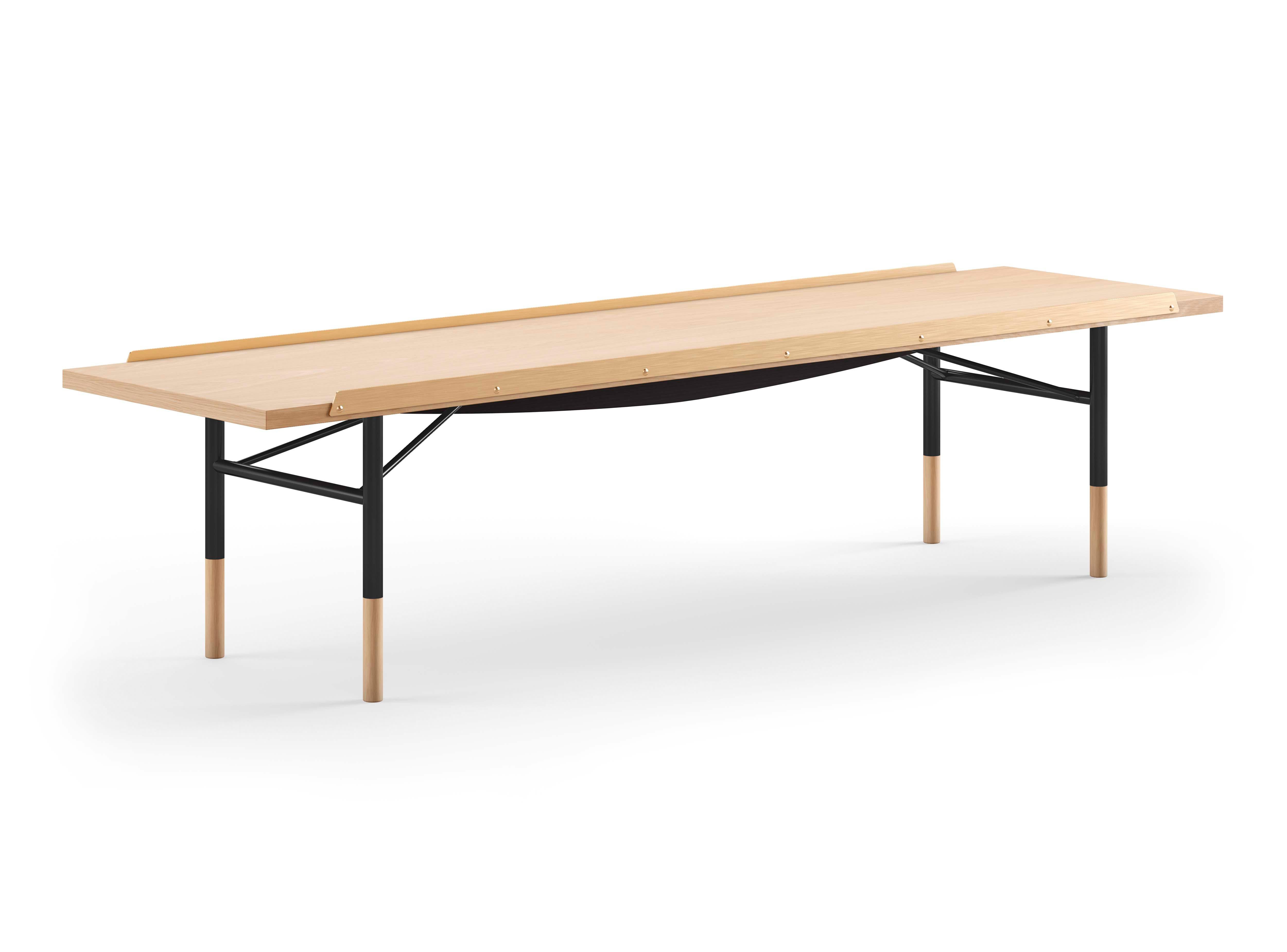Table bench designed by Finn Juhl in 1953, relaunched in 2012.
Manufactured by House of Finn Juhl in Denmark.

Finn Juhl experienced an international breakthrough in the USA during the early 1950s. He subsequently designed a range of furniture