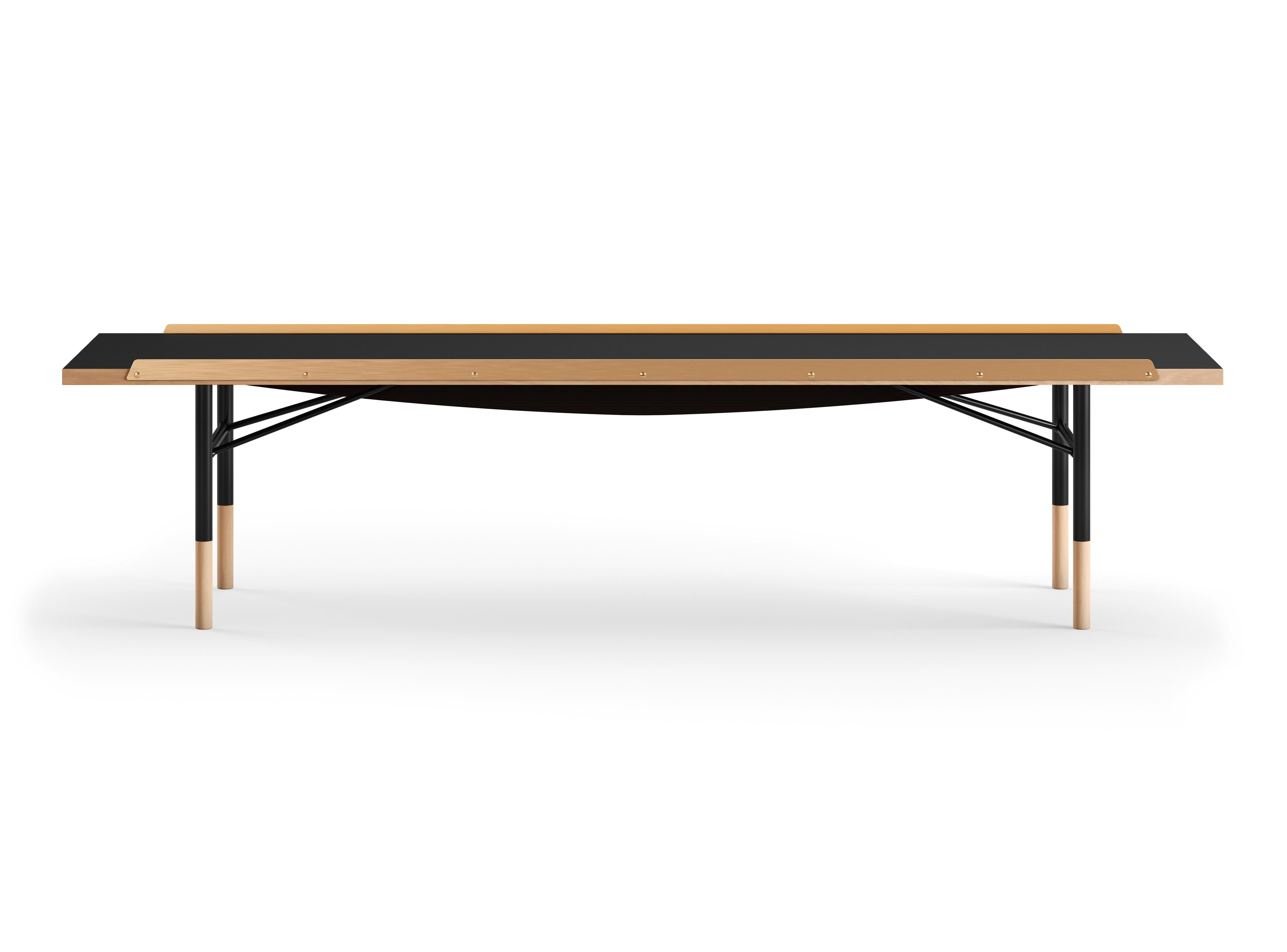 Table bench designed by Finn Juhl in 1953, relaunched in 2012.
Manufactured by House of Finn Juhl in Denmark.

Finn Juhl experienced an international breakthrough in the USA during the early 1950s. He subsequently designed a range of furniture