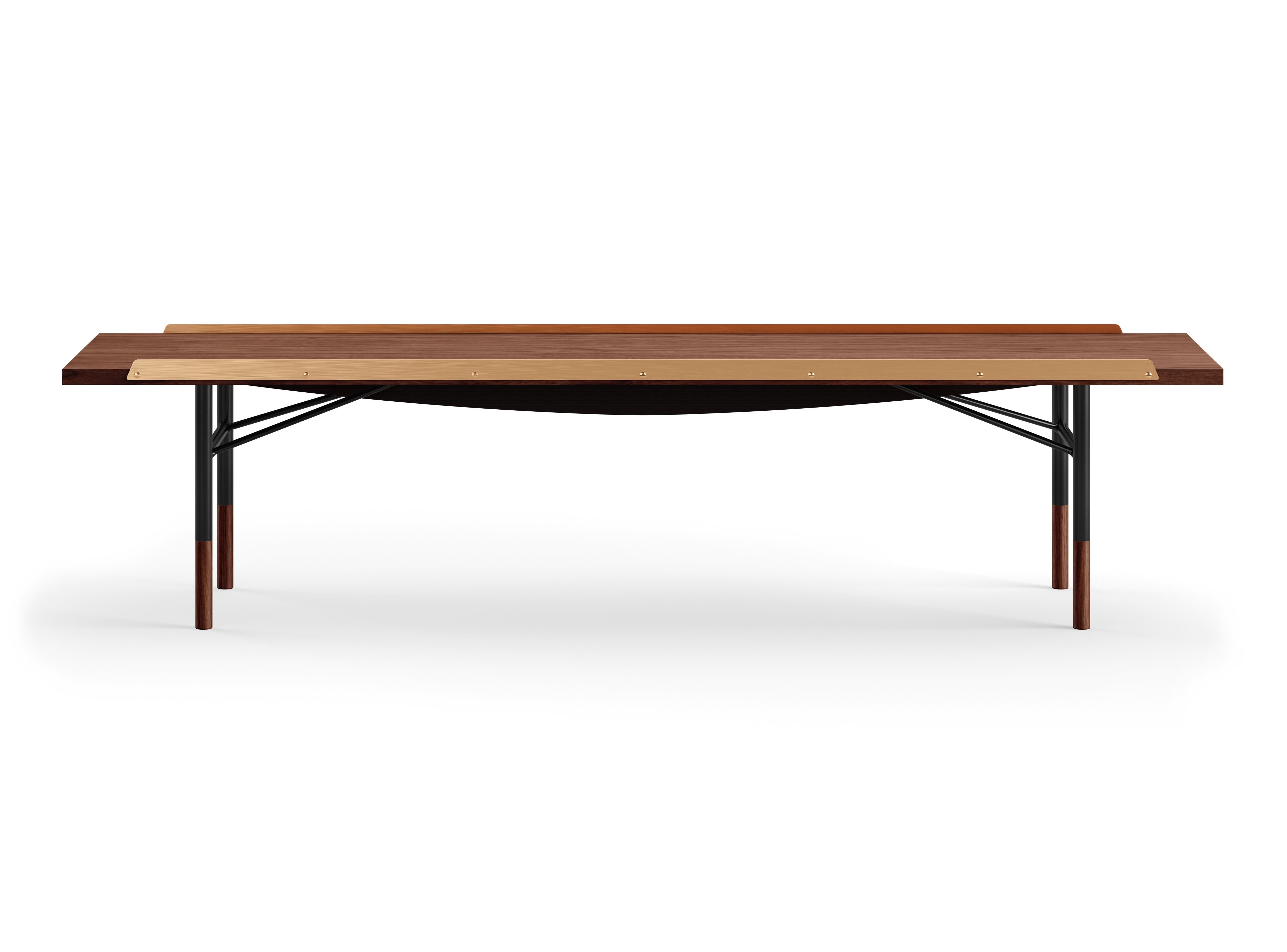 Table bench designed by Finn Juhl in 1953, relaunched in 2012.
Manufactured by House of Finn Juhl in Denmark.

Finn Juhl experienced an international breakthrough in the USA during the early 1950s. He subsequently designed a range of furniture