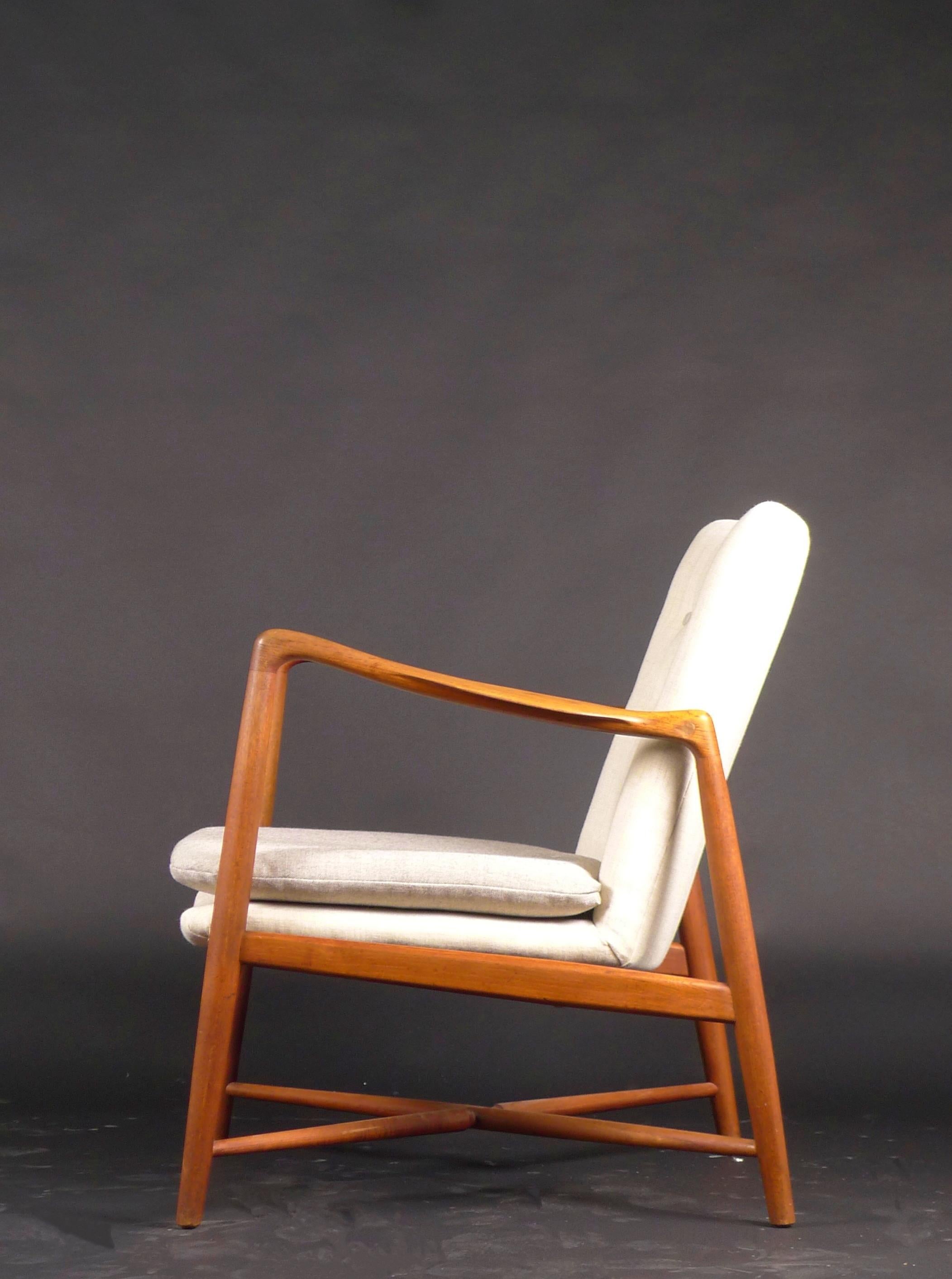 Chaise de cheminée en teck, modèle BO59, conçue par Finn Juhl en 1946 et fabriquée par Bovirke, Danemark.  

Ce modèle emblématique est également connu sous le nom de 