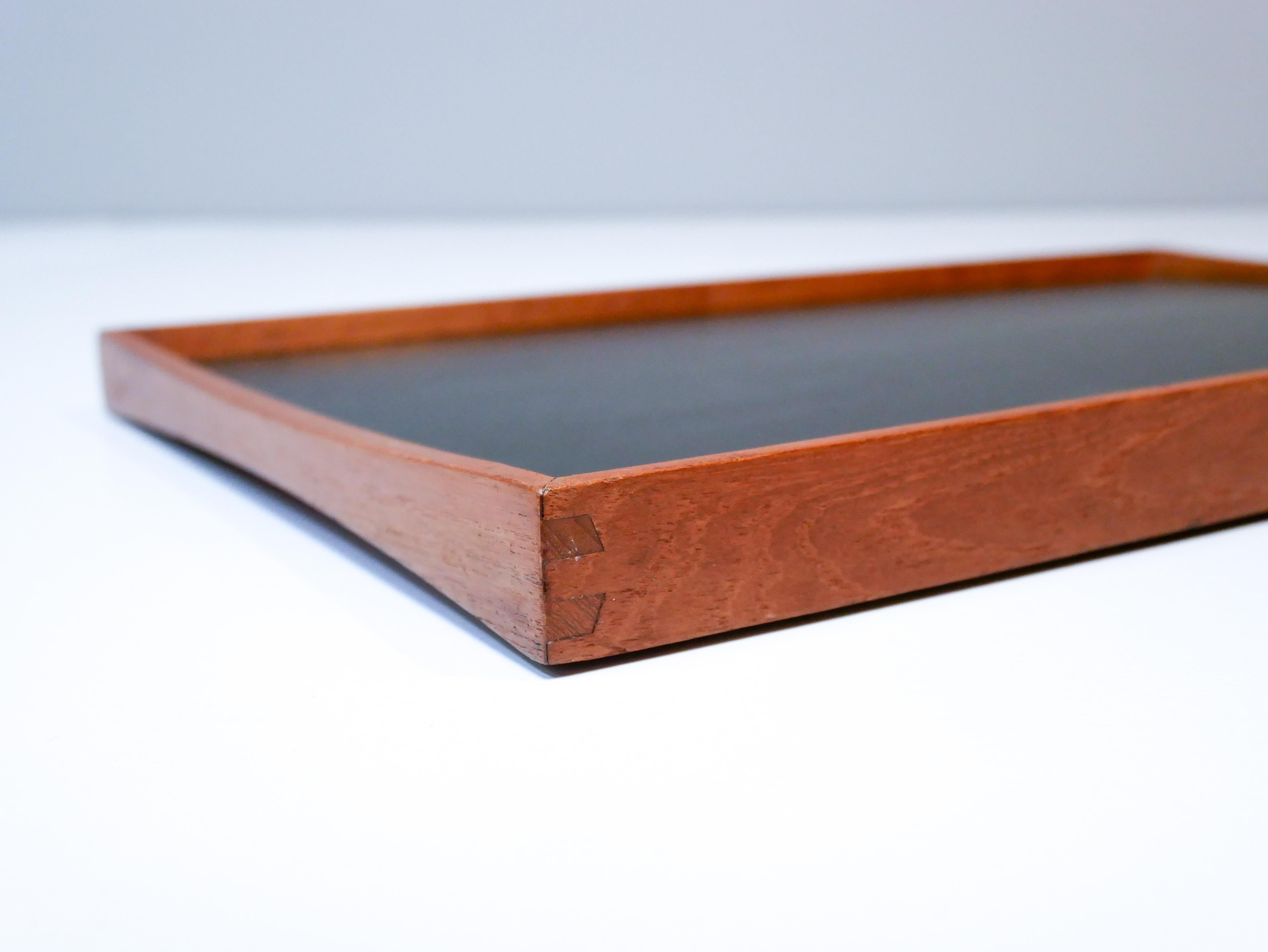 Finn Juhl reversebla tray for Torben Orskov, circa 1950s. 
With black / red formica, note marked 