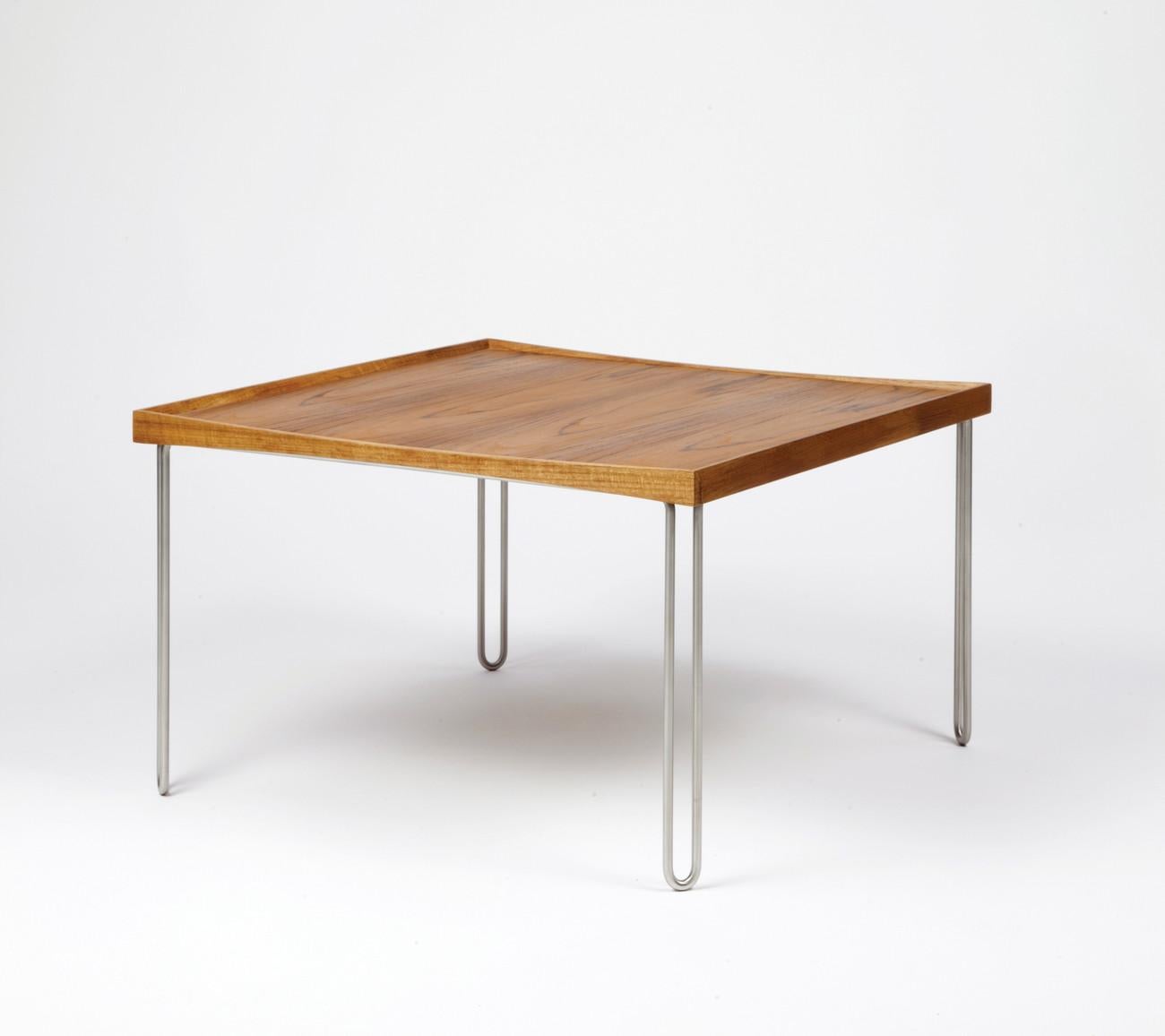 Table designed by Finn Juhl in 1965, relaunched in 2002.
Manufactured by House of Finn Juhl in Denmark.

The tray table, designed by Finn Juhl in 1965, is a further development of his famous Turning Trays, which today are manufactured by