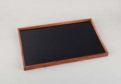 Finn Juhl, Turning Tray by Architectmade. Teak tray, black/mint green laminate.