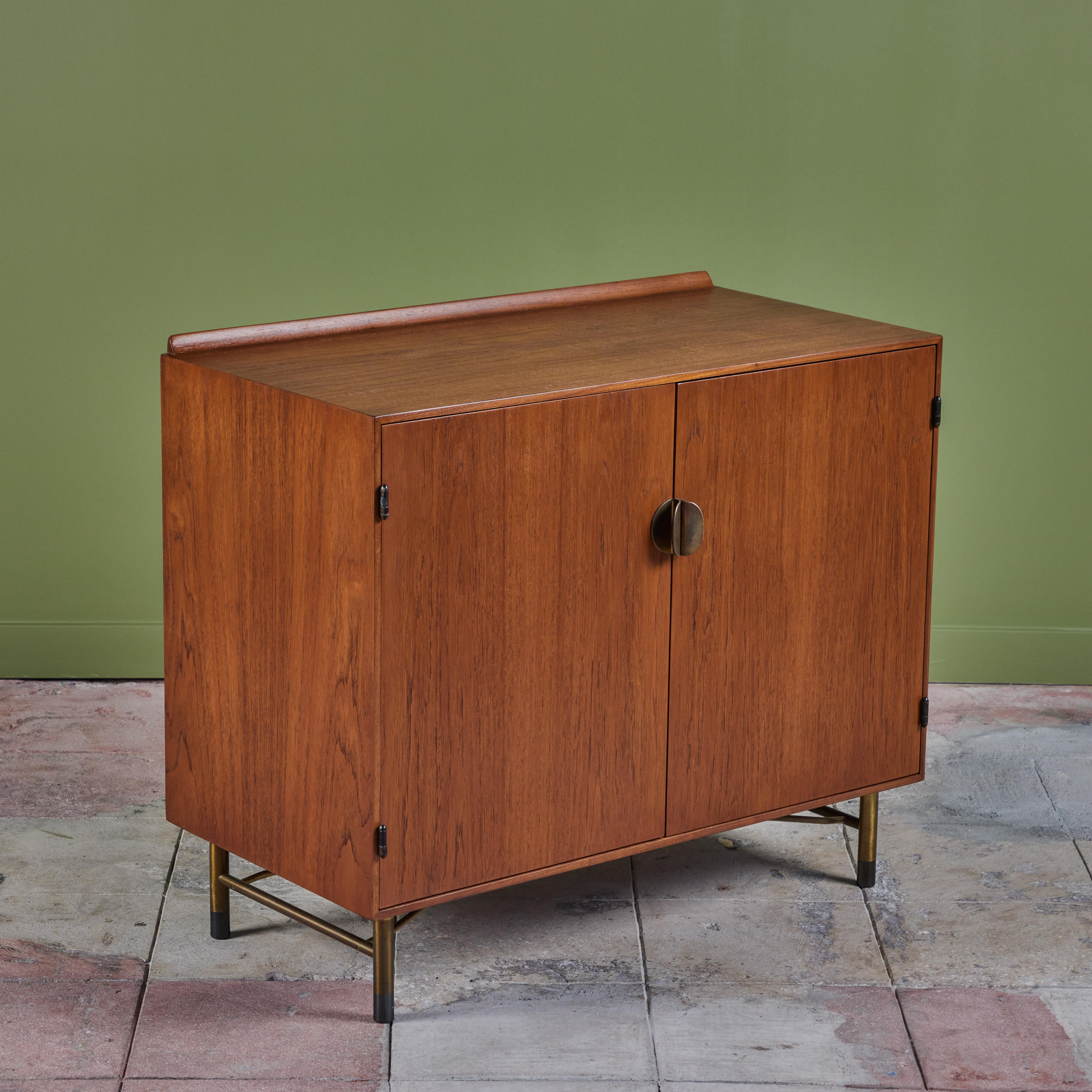 Finn Juhl designed this walnut cabinet for American manufacturer Baker furniture in the 1950s for their 
