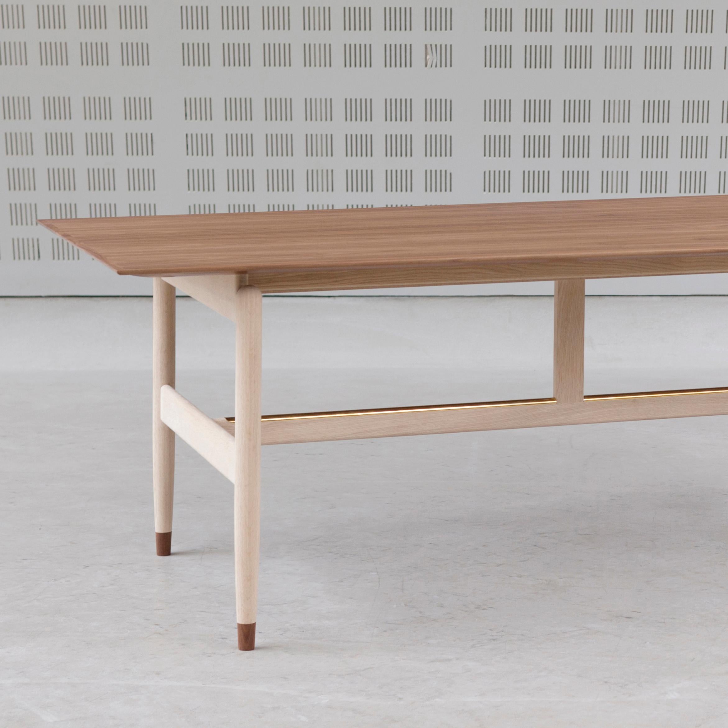 Table designed by Finn Juhl in 1945, relaunched in 2011.
Manufactured by House of Finn Juhl in Denmark.

The Kaufmann Table was originally designed for Finn Juhl’s own home, just like many other of his iconic designs. The table is in a league of