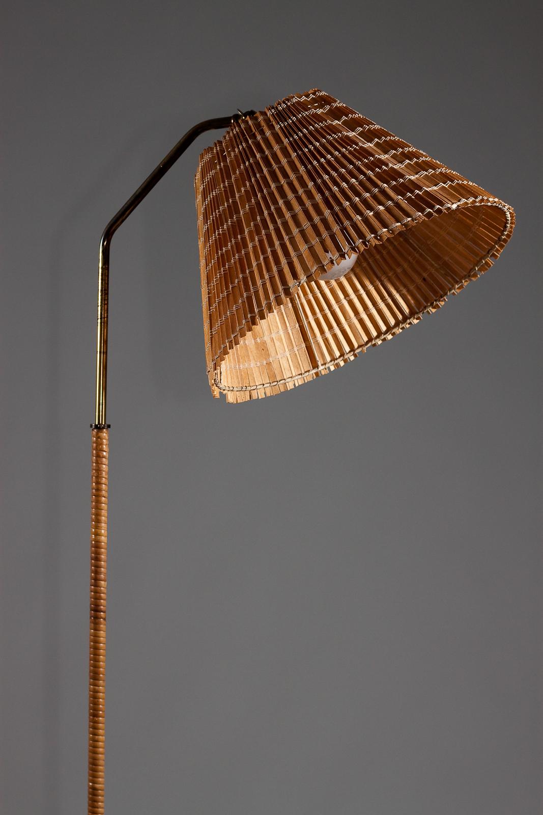 Scandinavian Modern Finnish 1950's brass floor lamp with wrapped rattan stem and wooden slat shade