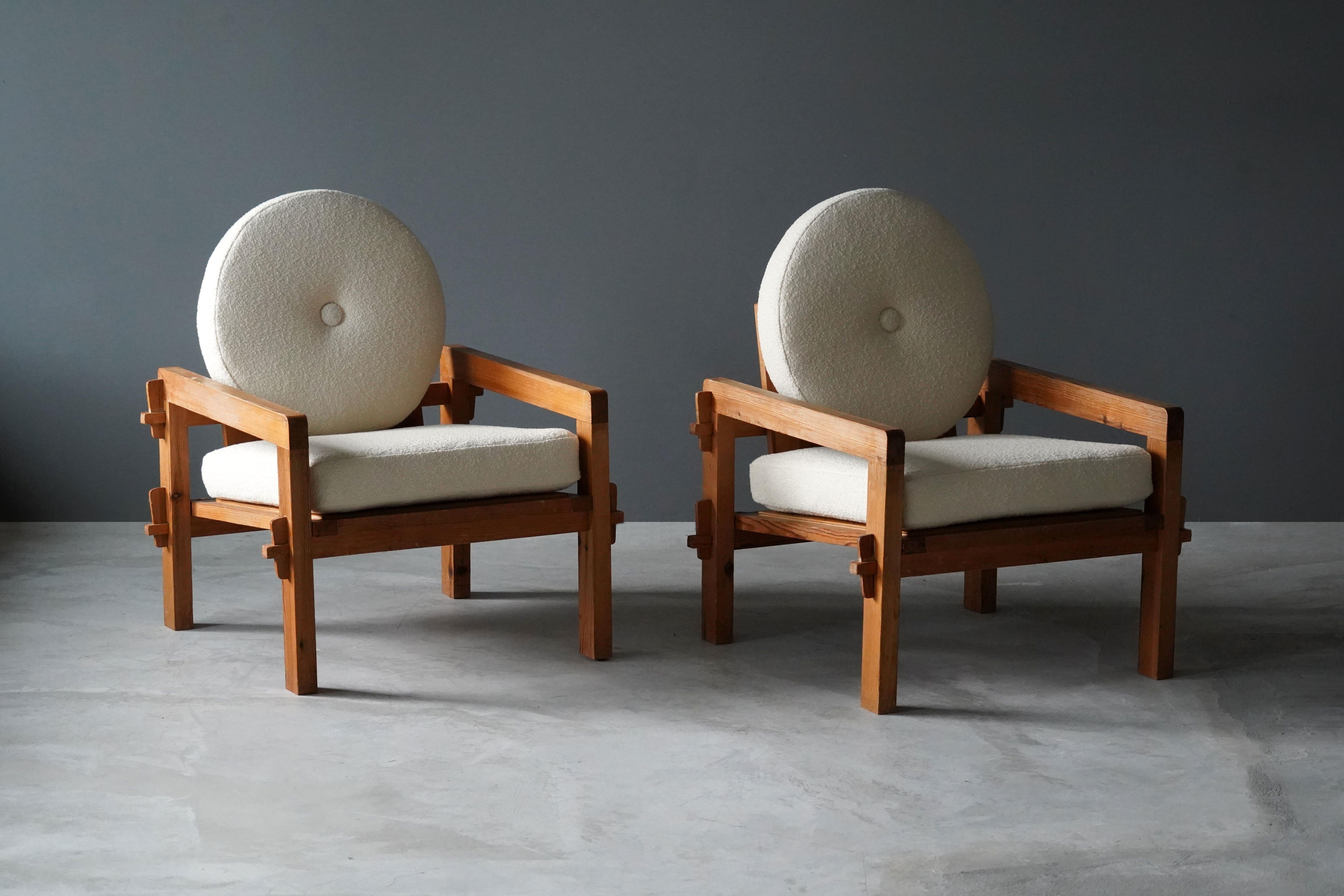 A pair of modernist lounge chair. Designed and made by a Finnish cabinetmaker, Helsinki, 1960s. In solid stained pine, with revealed joinery. Cushions upholstered in brand new high-end bouclé fabric.

Other designers of the period include Axel