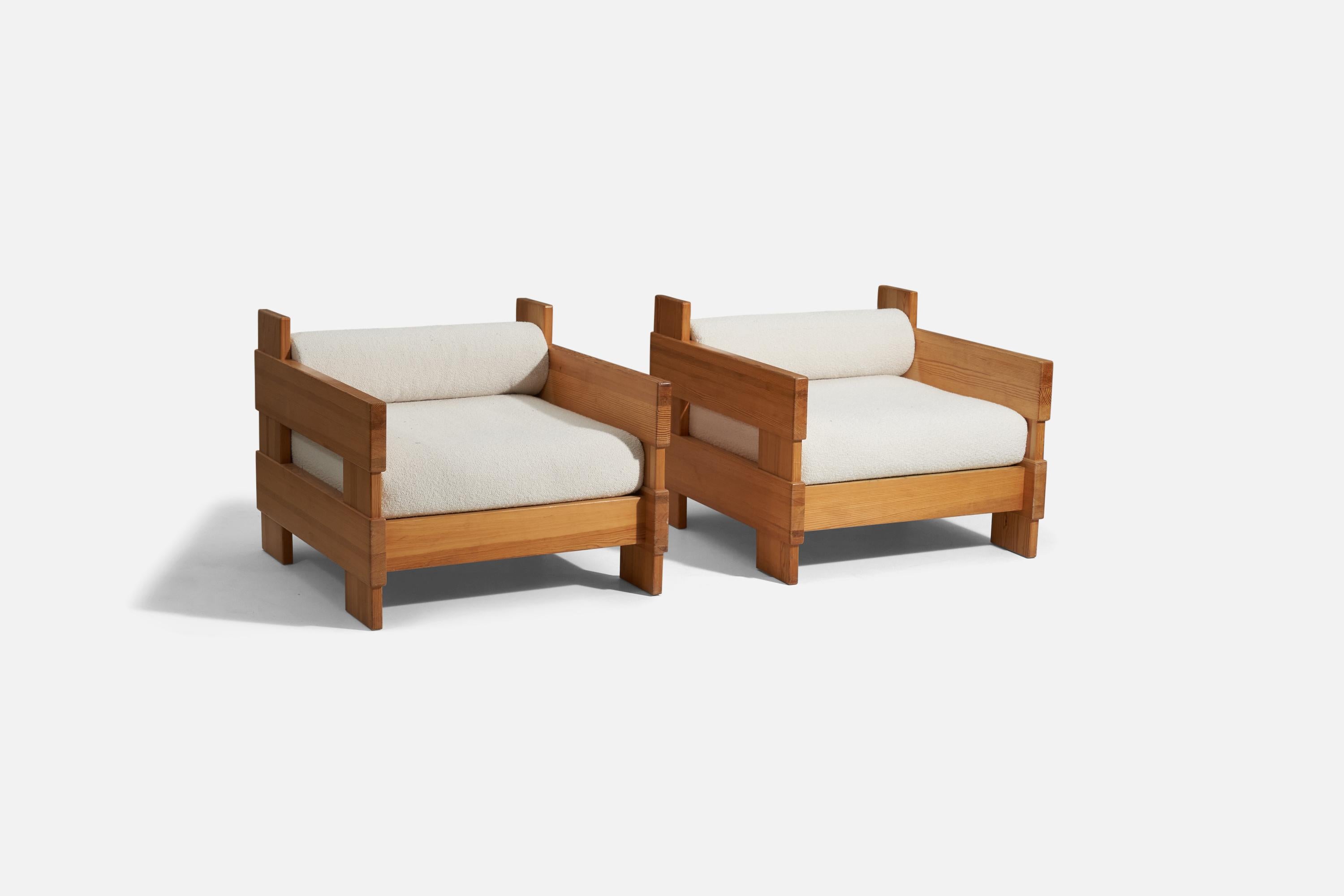 A pair of modernist lounge chair. Designed and made by a Finnish cabinetmaker, 1960s-1970s. In solid pine. Cushions upholstered in brand new high-end bouclé fabric.

Other designers of the period include Axel Einar Hjorth, Pierre Chapo, Charlotte
