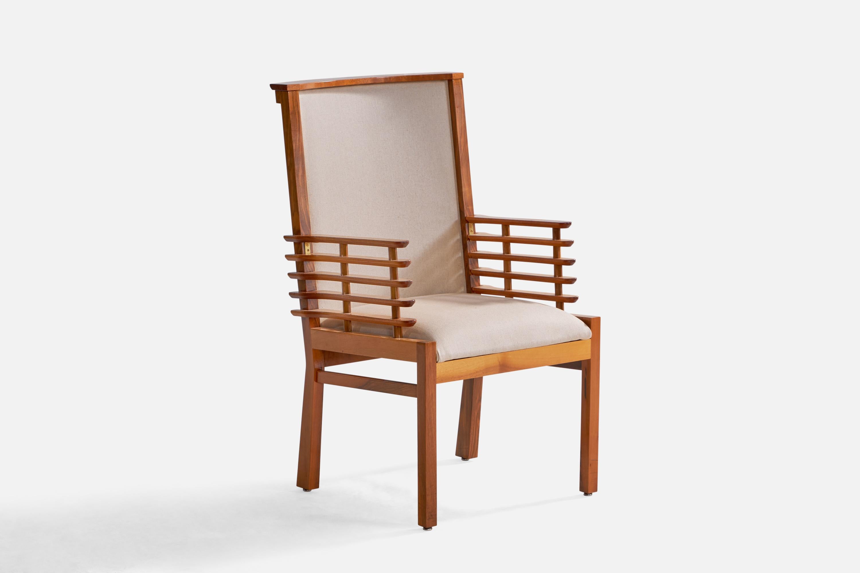 A walnut and off-white fabric armchair designed and produced in Finland, 1950s. 

Provenance: Helsingin Puhelinyhdistys

Seat height: 19.5”