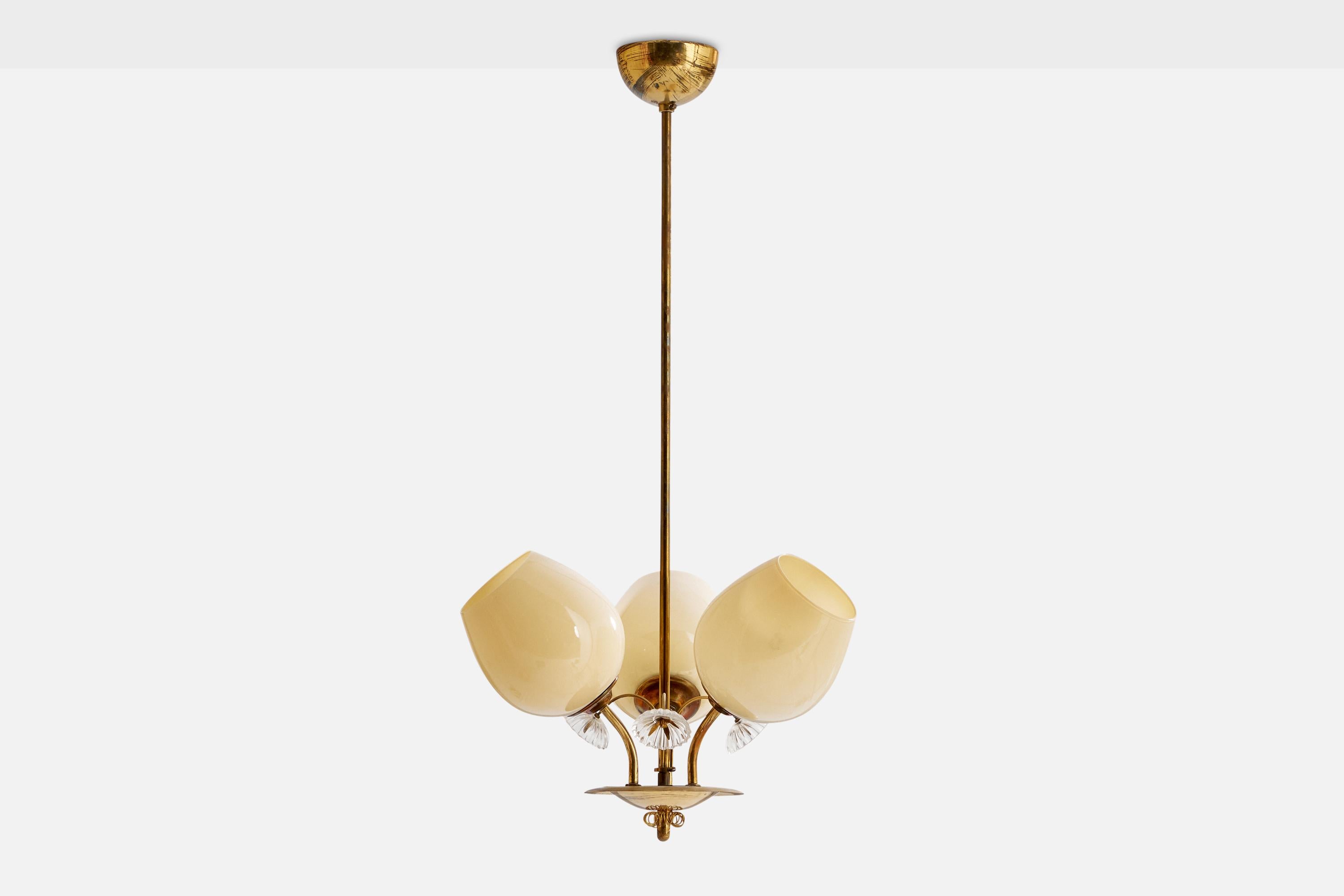 A brass, opaline glass and faceted glass chandelier designed and produced in Finland, 1940s.

Dimensions of canopy (inches): 2.3” H x 4” Diameter
Socket takes standard E-26 bulbs. 3 sockets.There is no maximum wattage stated on the fixture. All