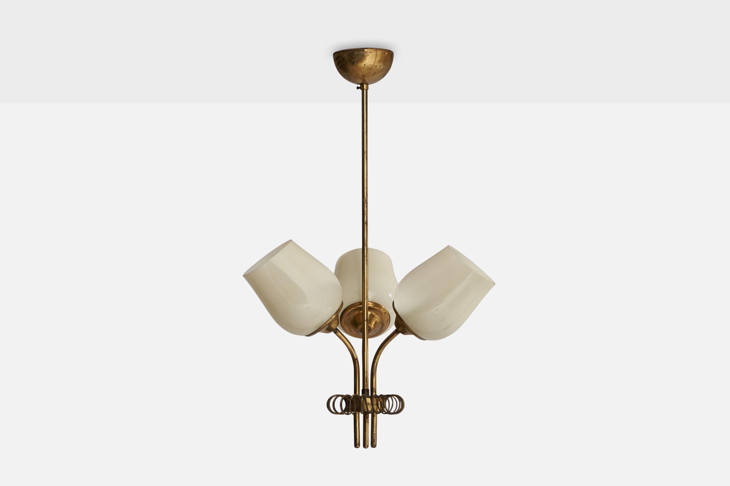 A brass and glass chandelier designed and produced in Finland, 1940s.

Dimensions of canopy (inches): 2.28” H x 4” Diameter
Socket takes standard E-26 bulbs. 3 sockets.There is no maximum wattage stated on the fixture. All lighting will be converted