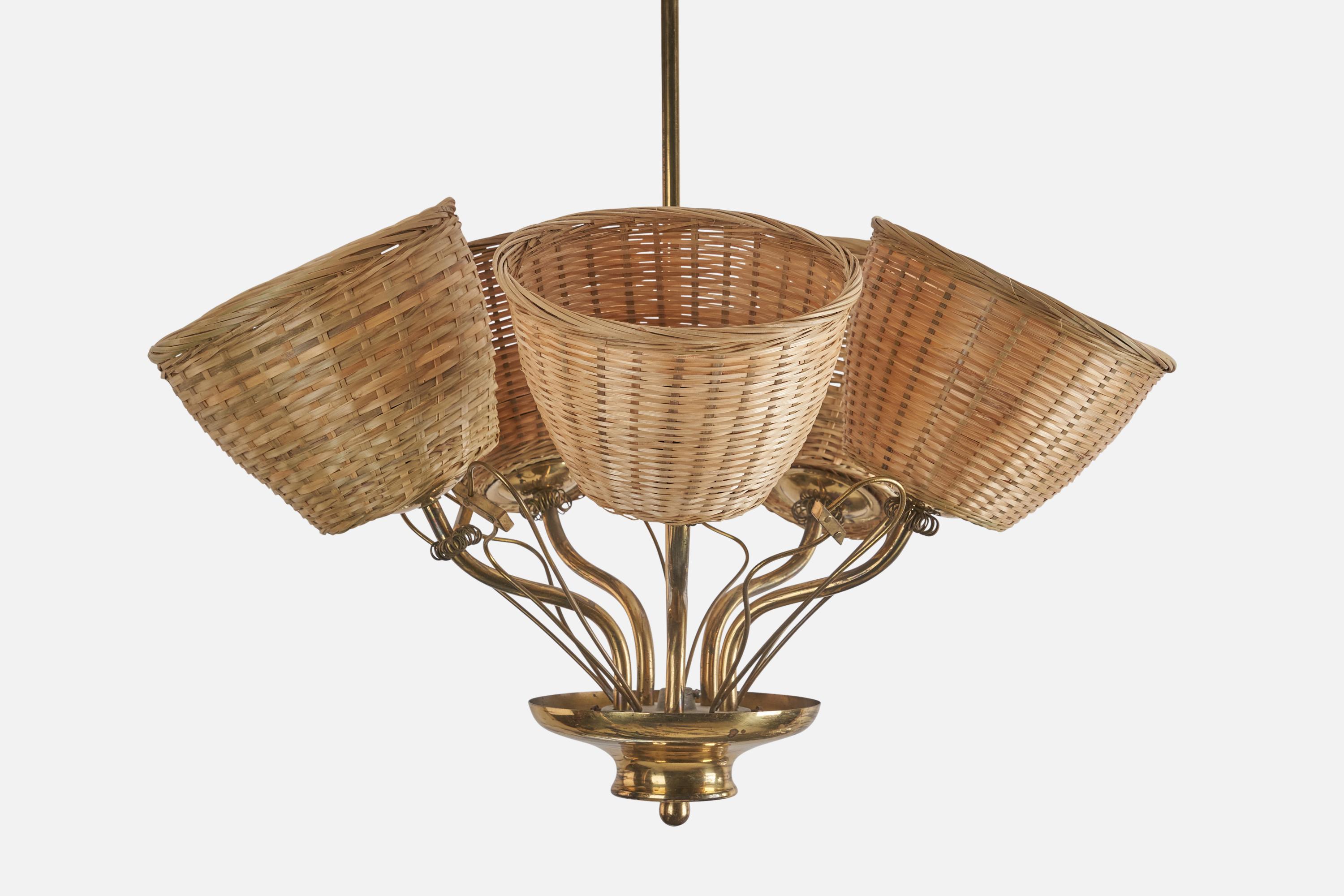 A brass and rattan chandelier designed and produced by a Finnish Designer, Finland, 1940s.

Dimensions of Canopy (inches) : 3 x 3.8 x 3.8 (Height x Width x Depth) 

Sockets take standard E-26 medium base bulbs.

There is no maximum wattage