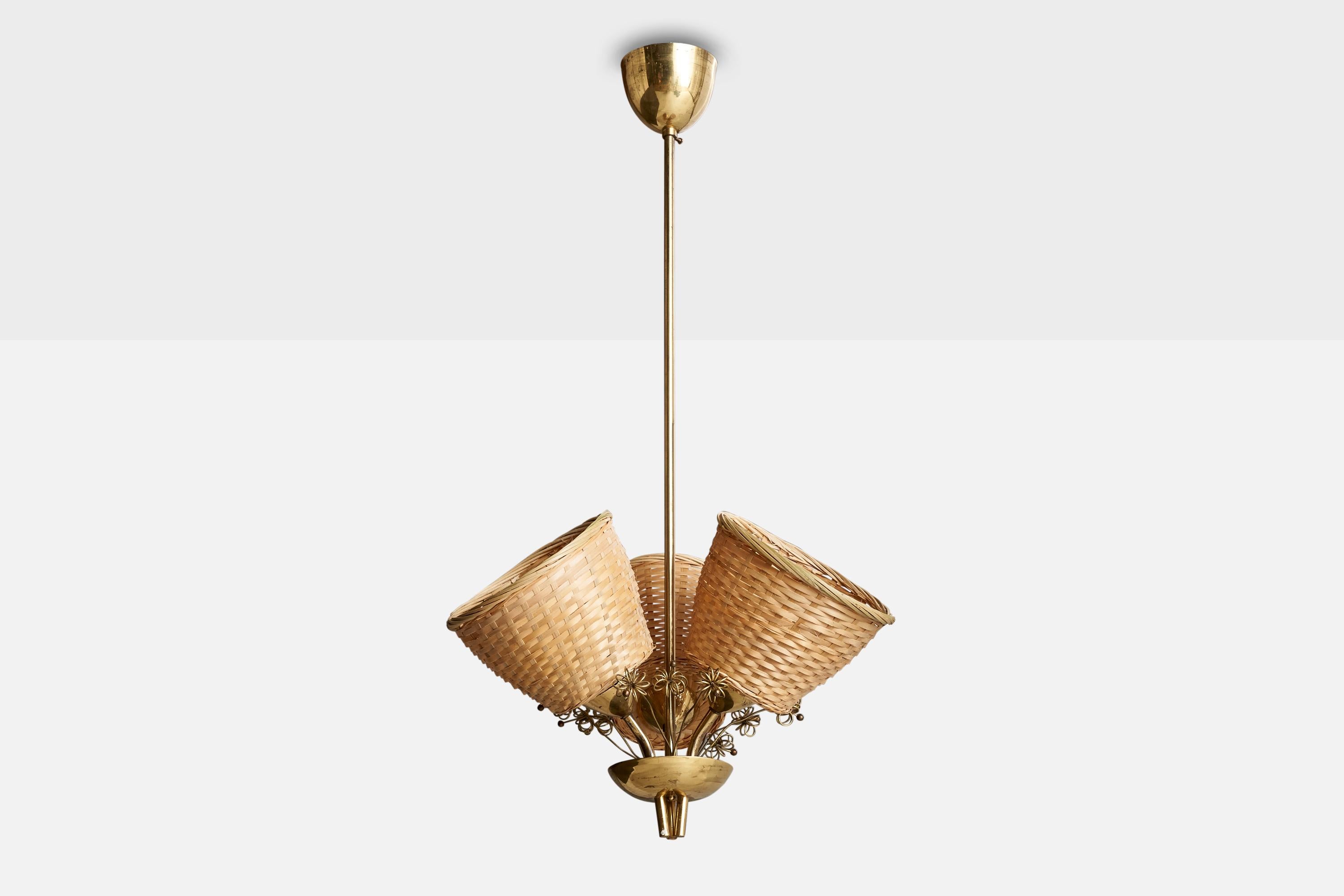 Lustre en laiton et rotin conçu et produit en Finlande, C.C. 1940.

Dimensions globales (pouces) : 29