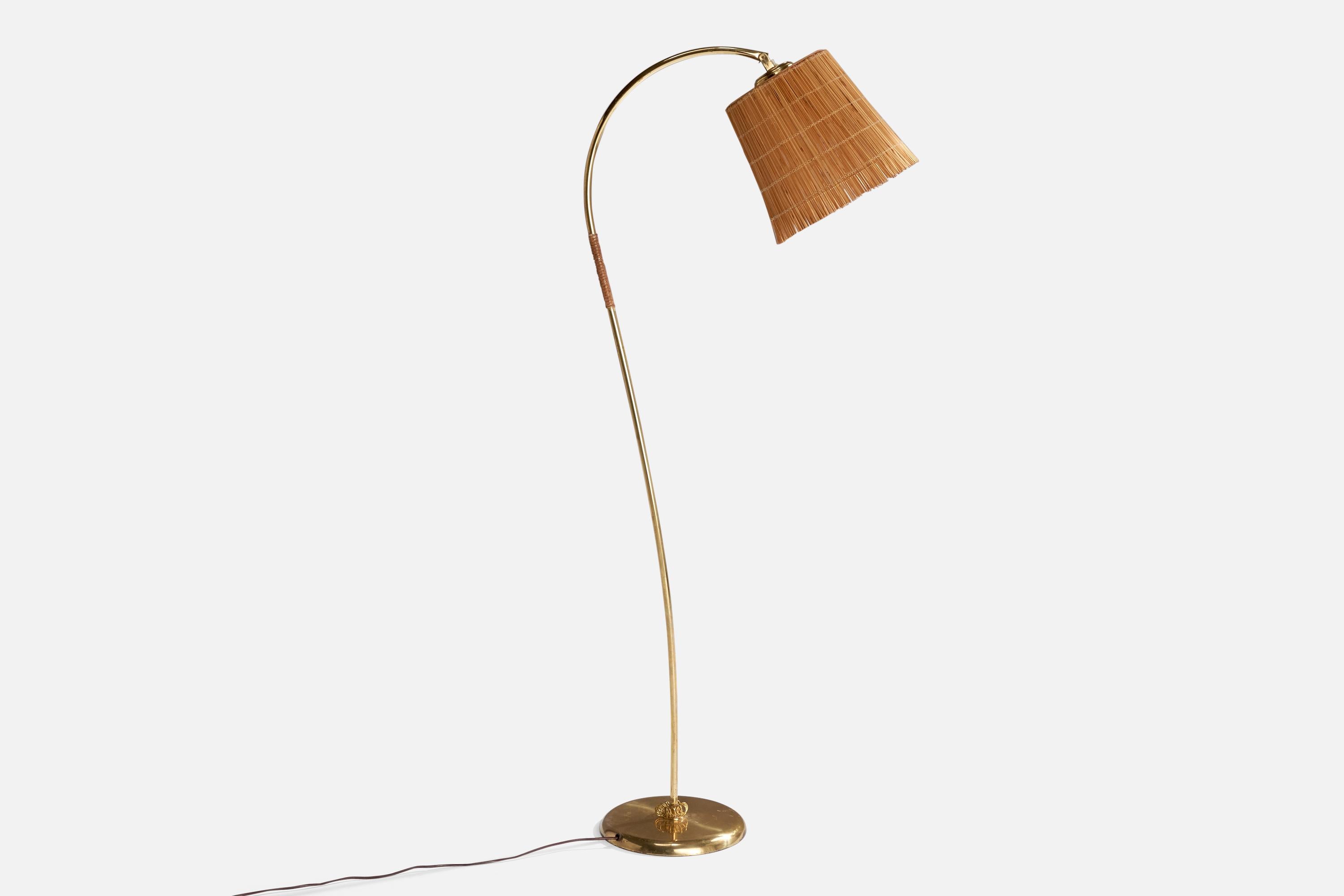 Lampada da terra in ottone, rattan e canna intrecciata progettata e prodotta in Finlandia, anni '50 circa.

Dimensioni della lampada con paralume (pollici): 59,75