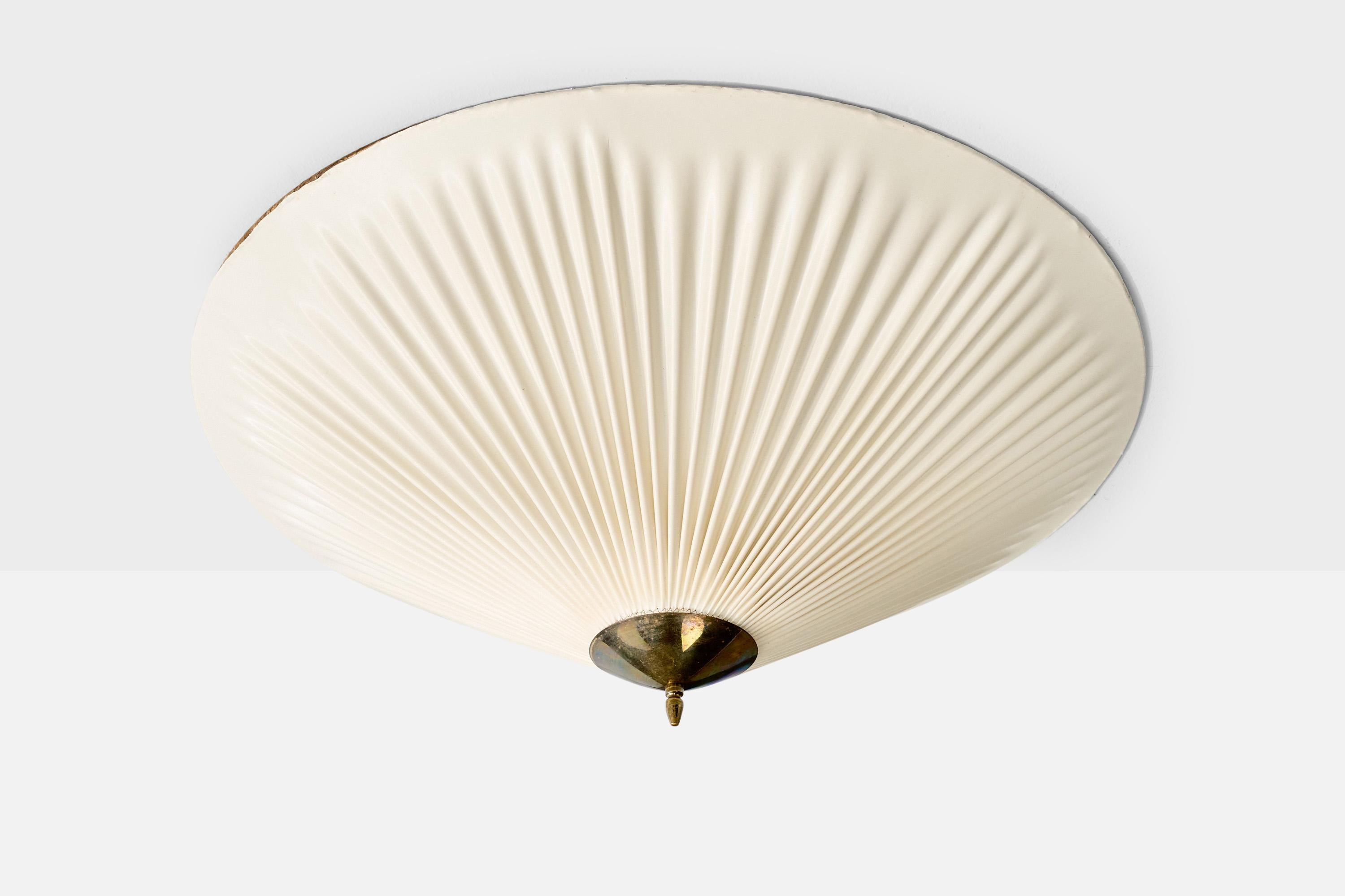 A brass and fabric flush mount designed and produced in Finland, c. 1950s.

Overall Dimensions (inches): 10” H x 27.5” Diameter

Bulb Specifications: E-26 

Number of Sockets: 3

All lighting will be converted for US usage. We are unable to confirm