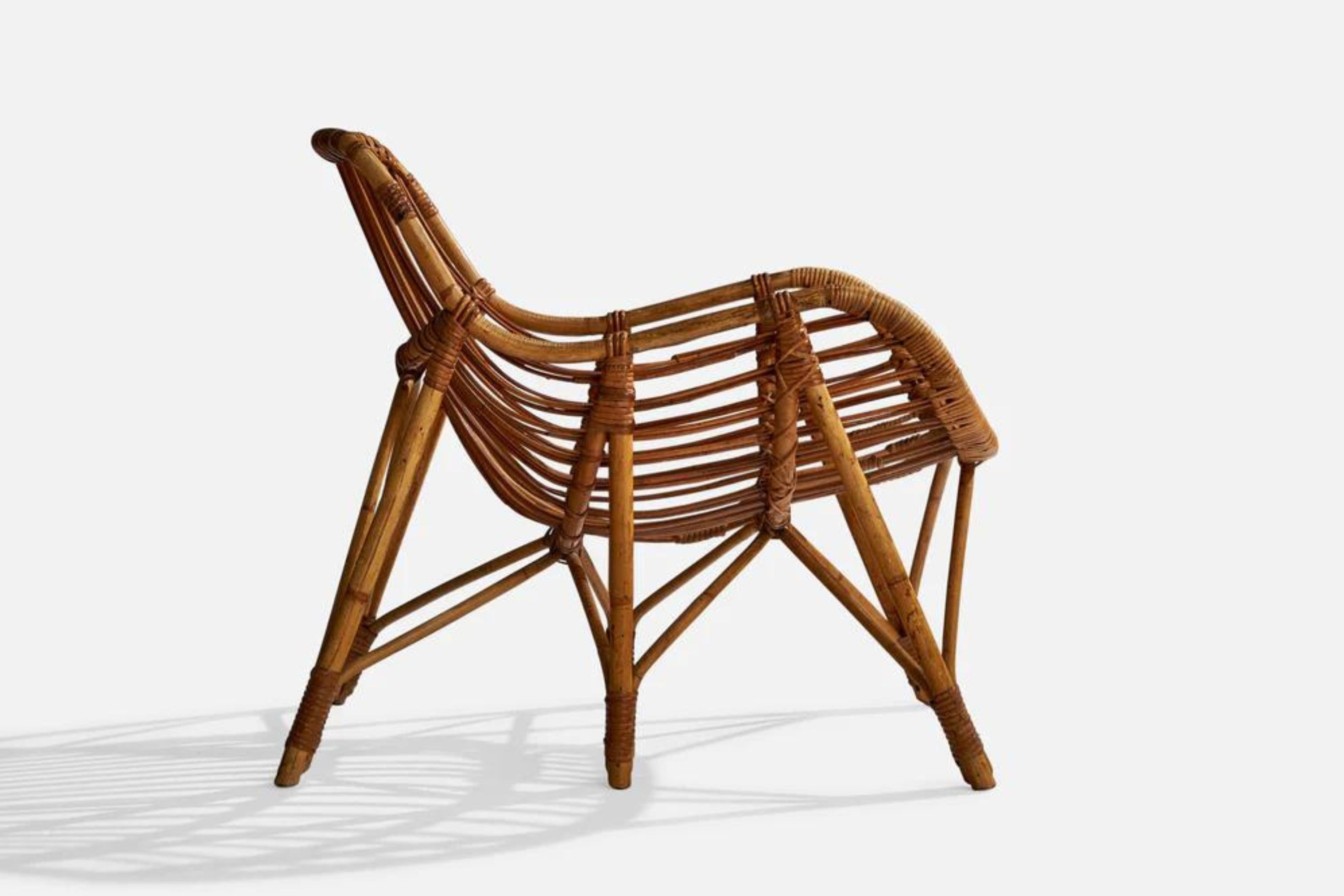 A moulded bamboo and rattan lounge chair designed and produced in Finland, 1940s.

Seat height 14.25