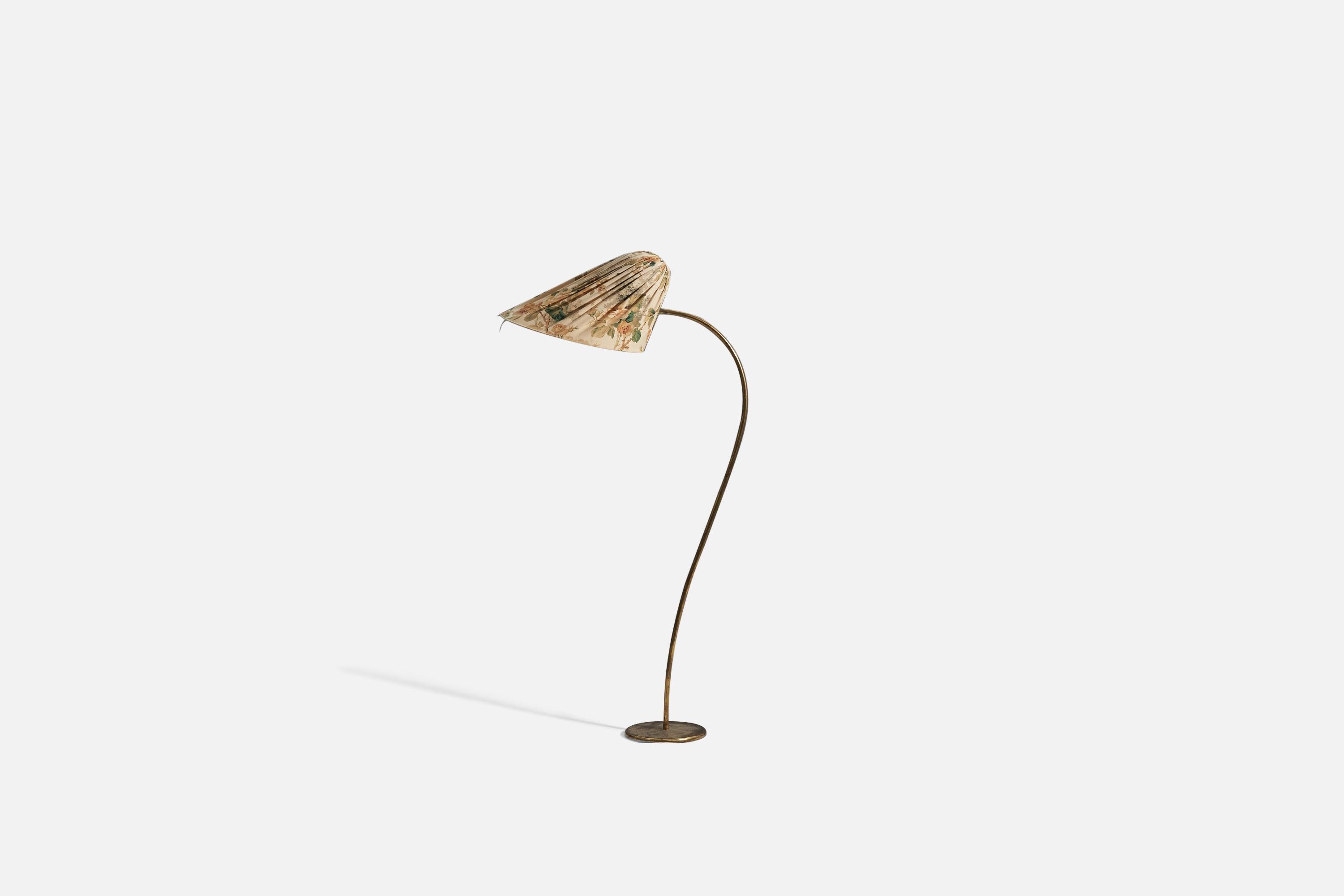 A brass and fabric with floral motifs floor lamp designed and produced in Finland, c. 1940s. 

 
