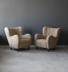 Finnish Designer, Organic Lounge Chairs, Sheepskin, Stained Wood, Finland, 1940s