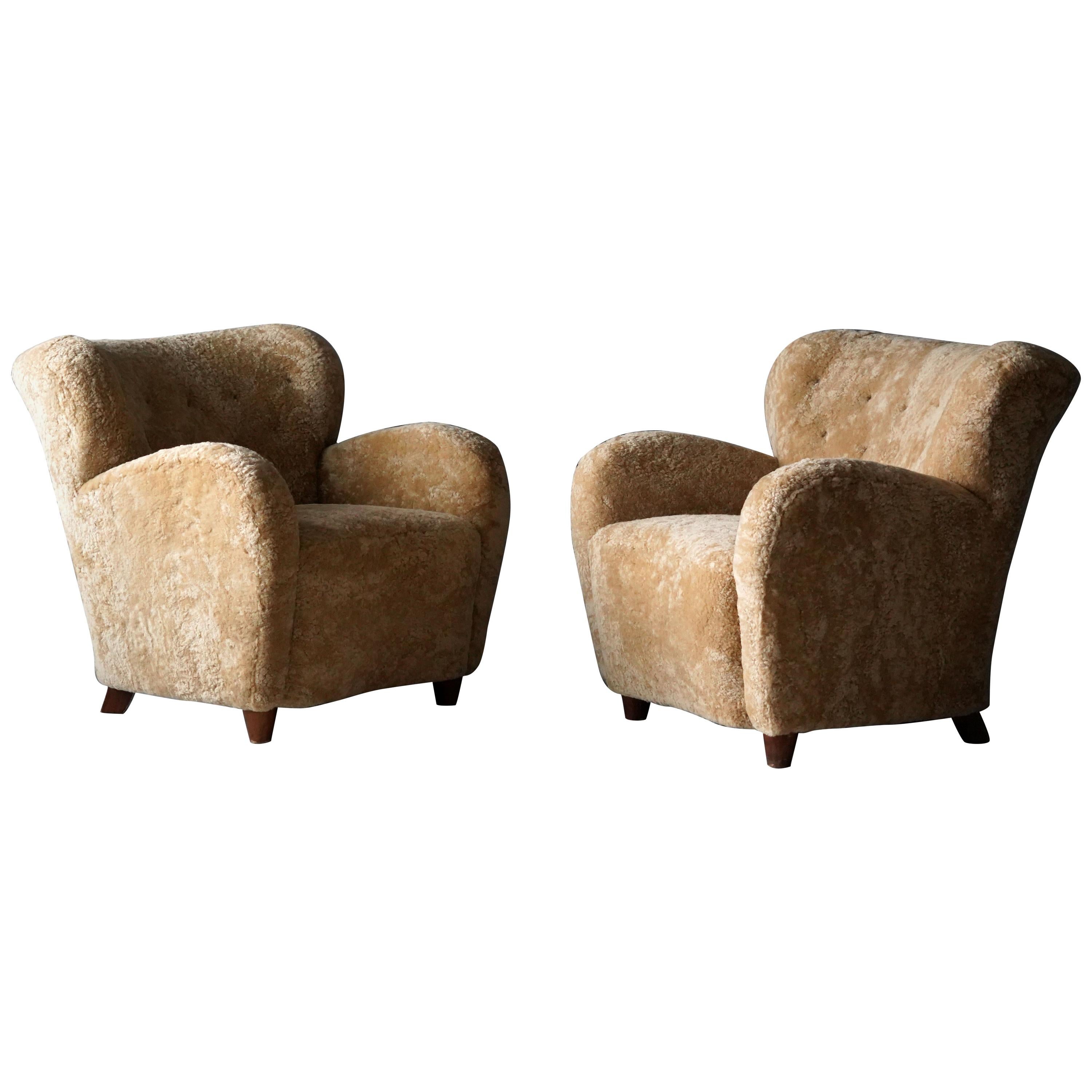 Finnish Designer, Organic Lounge Chairs, Sheepskin, Stained Wood, Finland, 1940s