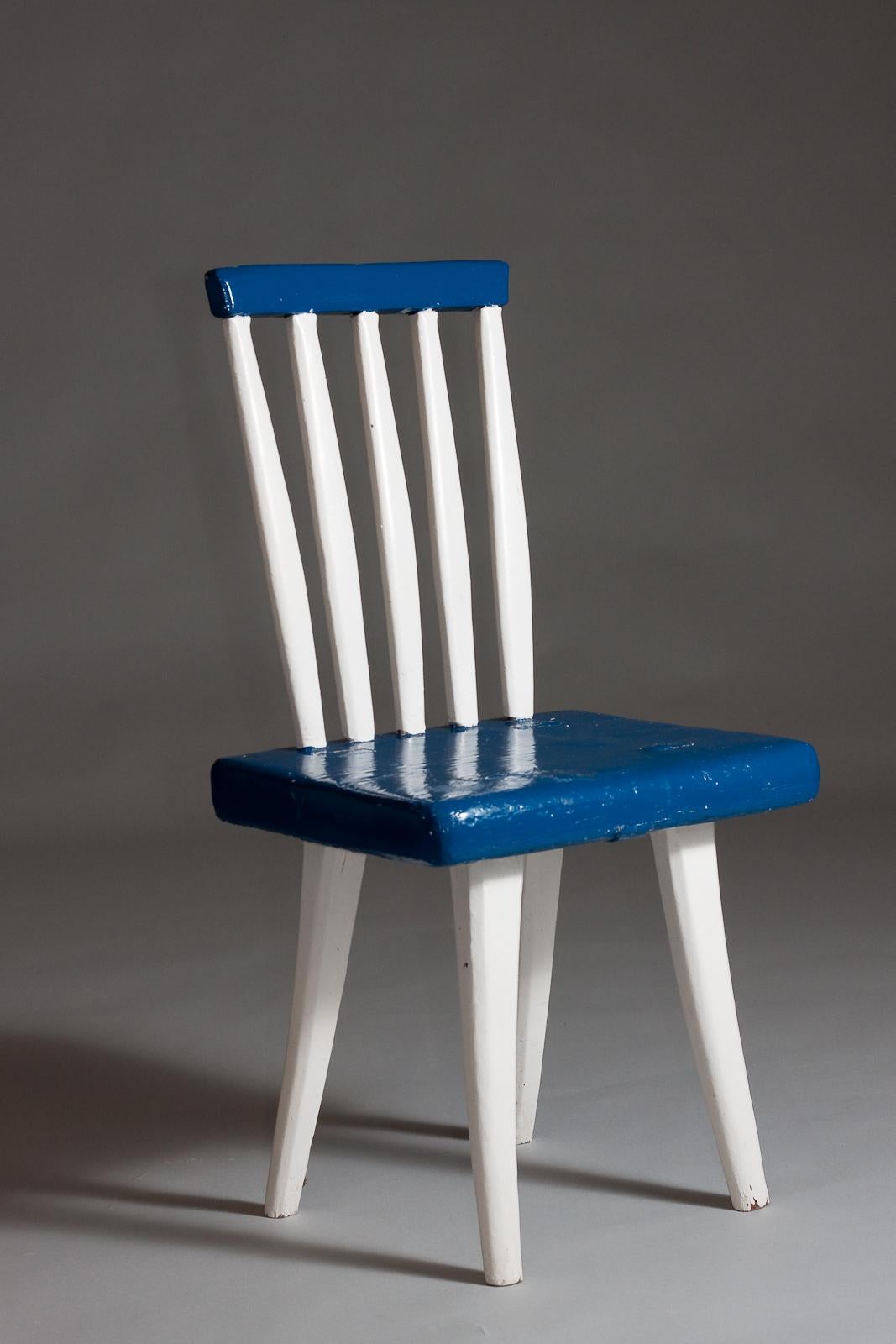 Step into the beauty of Nordic heritage with our exquisite Finnish early 20th century painted chair, available exclusively at Nordisten. This hand-made masterpiece showcases a timeless blend of blue and white, meticulously crafted to reflect the