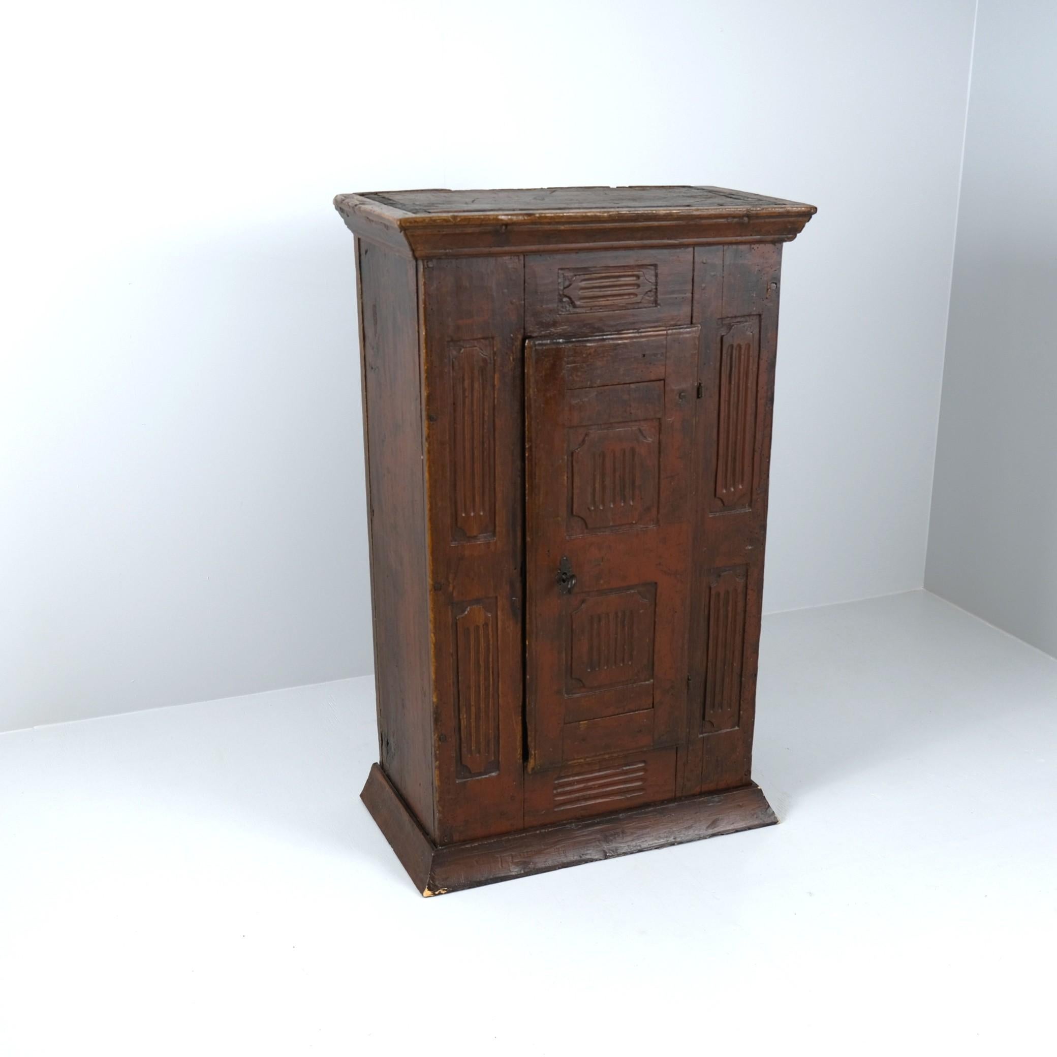 An impressive, late 18th century Finnish folk art cupboard, in full original condition featuring very heavy patina and signs of a long life. Amazingly the cupboard still retains the original lock and key mechanism. As you can see the item features
