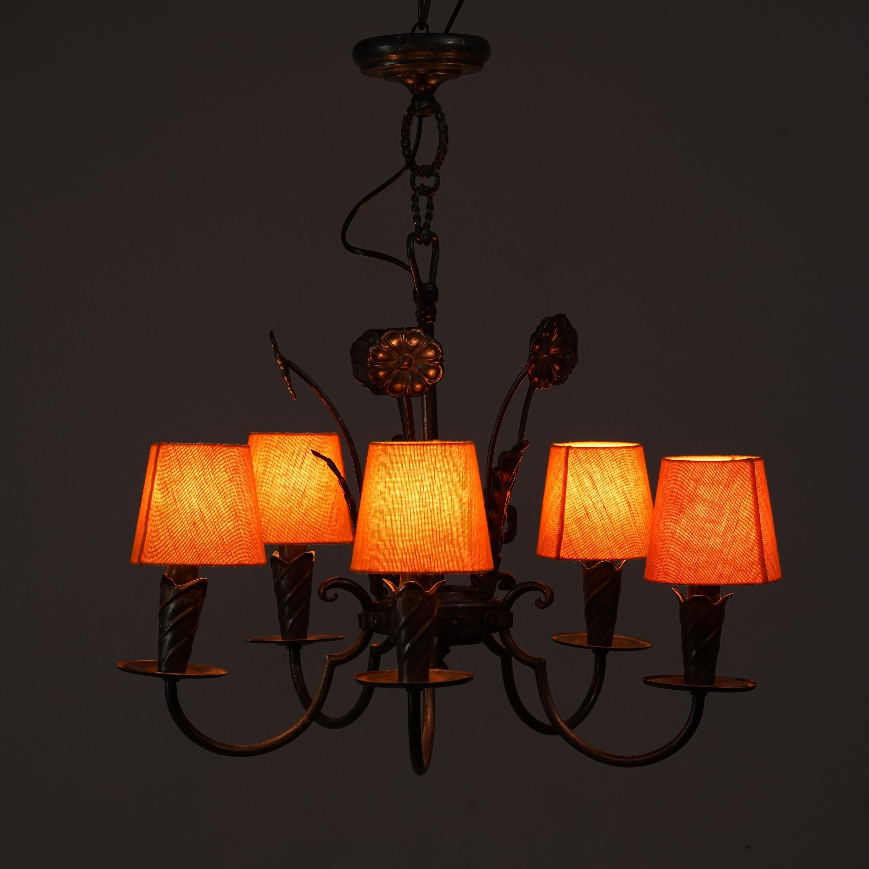 Finnish Iron Chandelier by Taidetakomo Hakkarainen / Antti Hakkarainen from the 1930s. Forged iron with fabric lampshades. Good vintage condition, minor wear consistent with age and use.