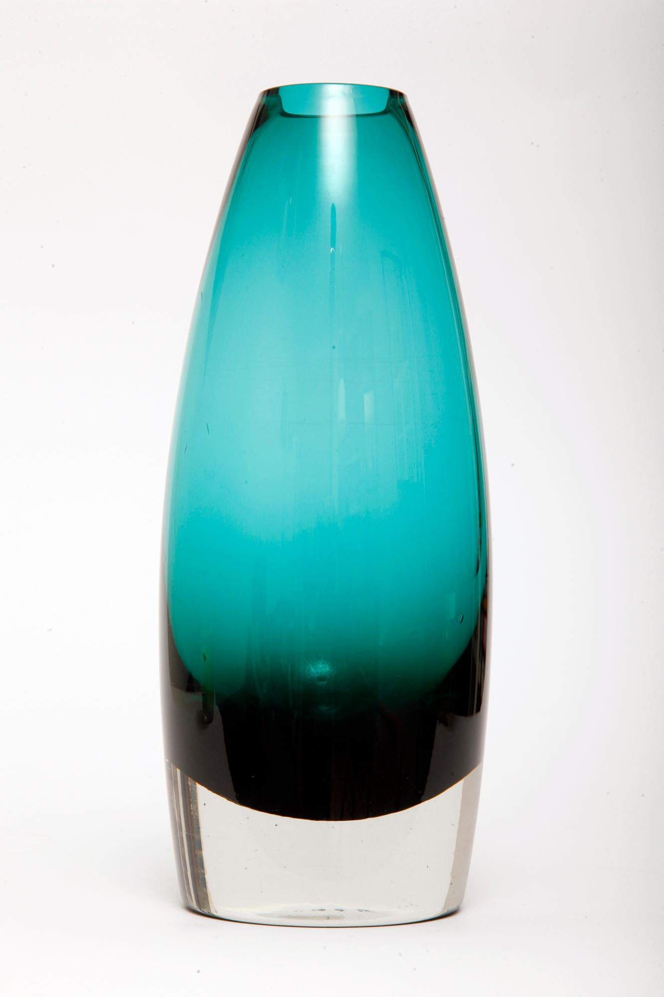 The perfect combination and color saturation, a wonderful contrast between the top and the bottom of the vase. Perfect symmetry.
The essence of modernism. Wonder.

This is a midcentury Scandinavian Modern, Art glass vase, attributed to the