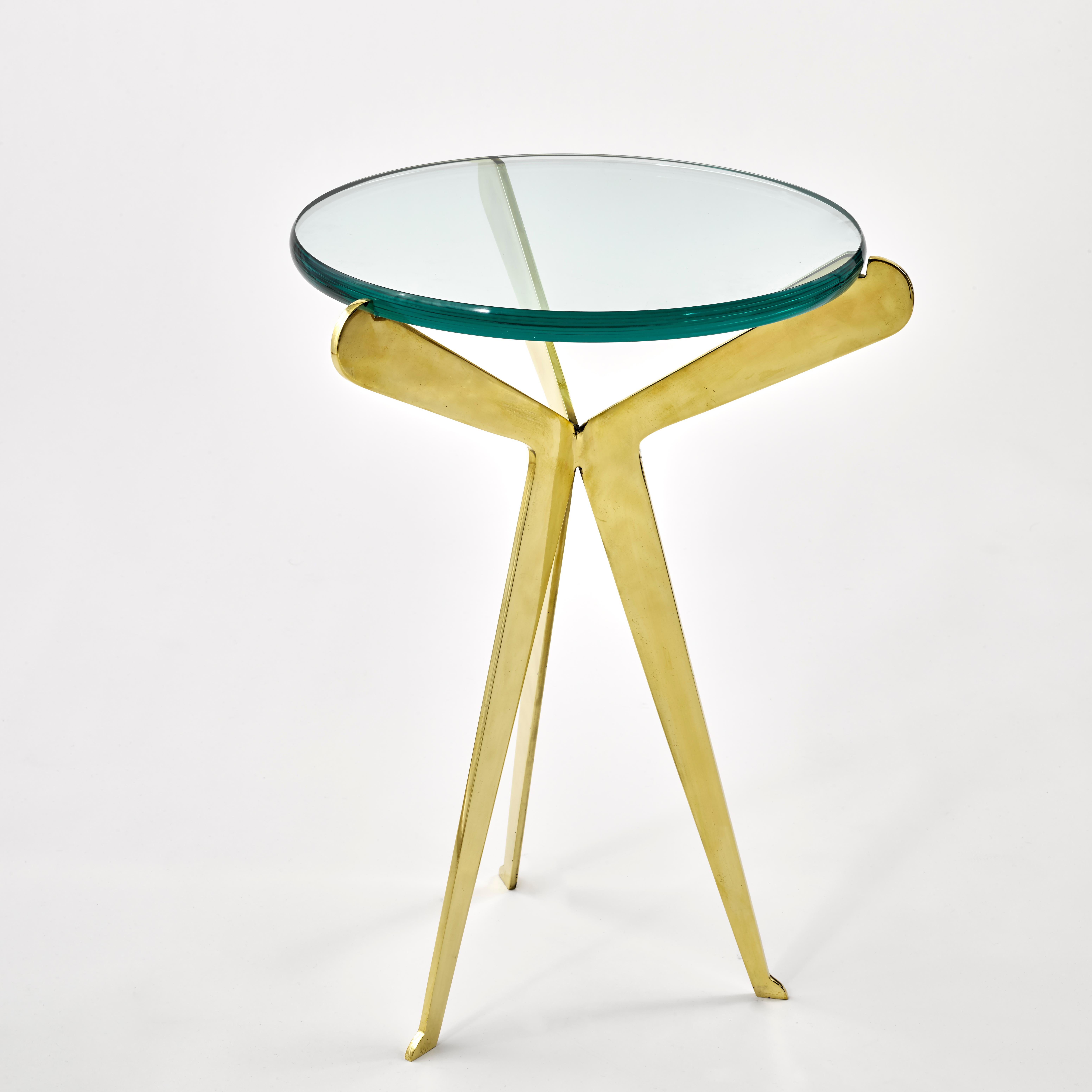  The Fiore table features three brass legs coming together at a central weld and then sprouting to hold a thick glass top. Shown in polished brass.

Customization Options: 

Each piece is hand crafted in Italy and is available in any of our 10