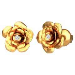 Used Fiori 14k gold stud earrings with diamonds