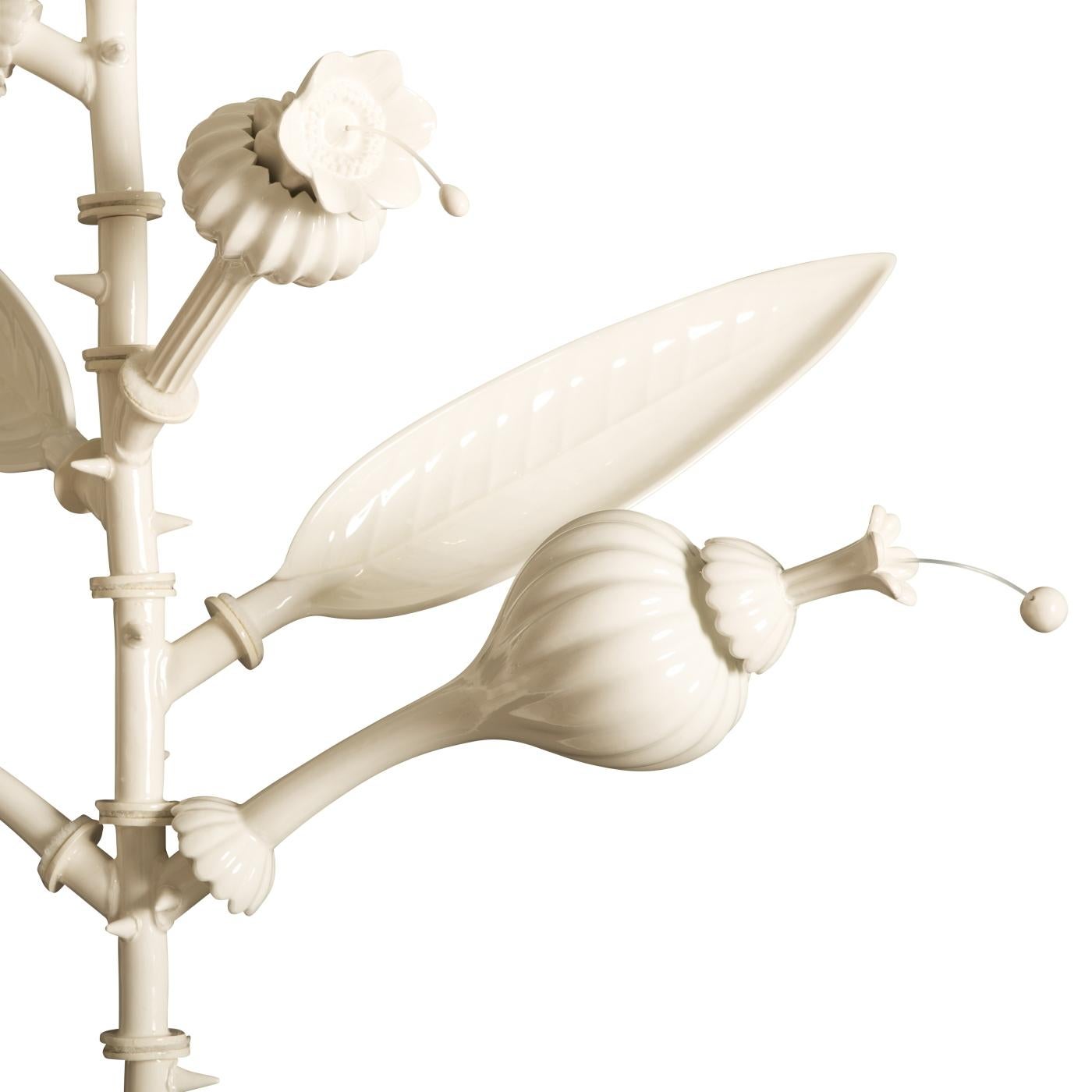 White glazed ceramic ascends gracefully from the roots and stem to form six detachable leaves and flowers. Handcrafted flawlessly, this big eccentric design object exemplifies the playful but elegant approach of Roberto Cambi. Sold in single