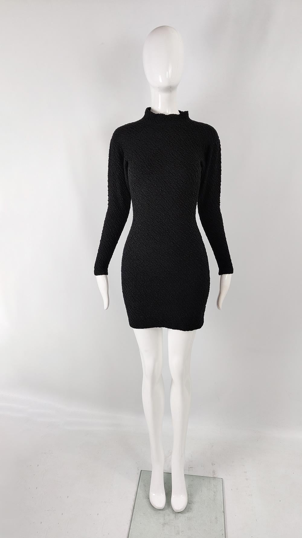 A sexy and fun vintage womens party dress from the 80s by luxury Italian fashion house, Fiorucci. Fiorucci were known for their fun designs in bold or experimental fabrics and this dress is a great example of this. Made in Italy from a black body