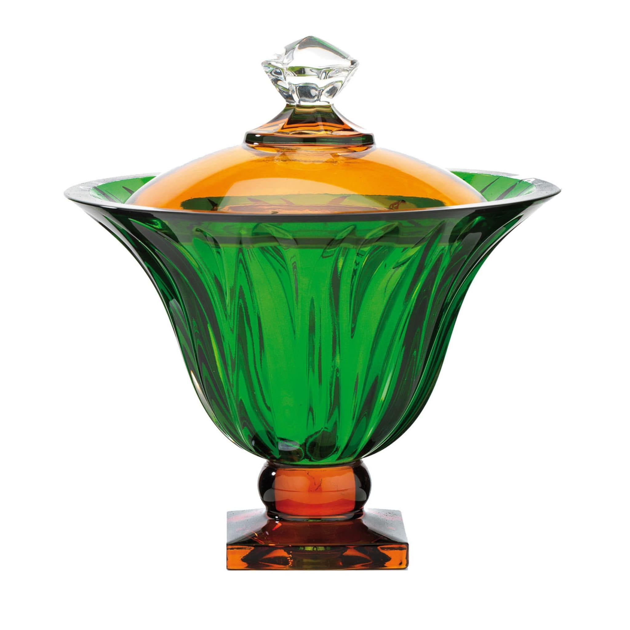 Traditional and contemporary influences harmoniously coexist in this precious crystal box. Offered in a vibrant combination of amber and green, it is distinguished by a pleasant texture extending throughout the bell-like bowl, while the lid and