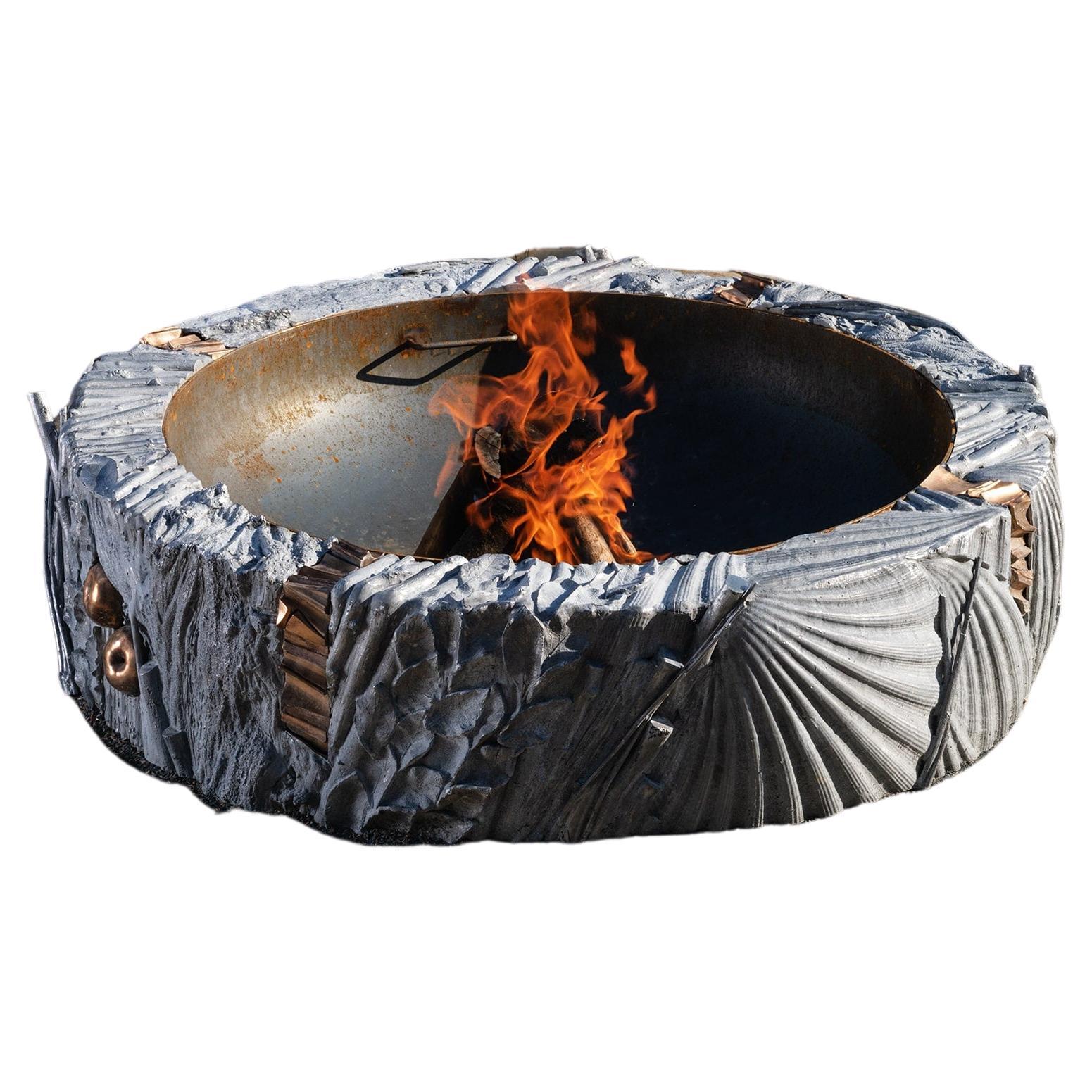 Fire element by Ondřej Oliva - sculptural fire pit, aluminum and bronze