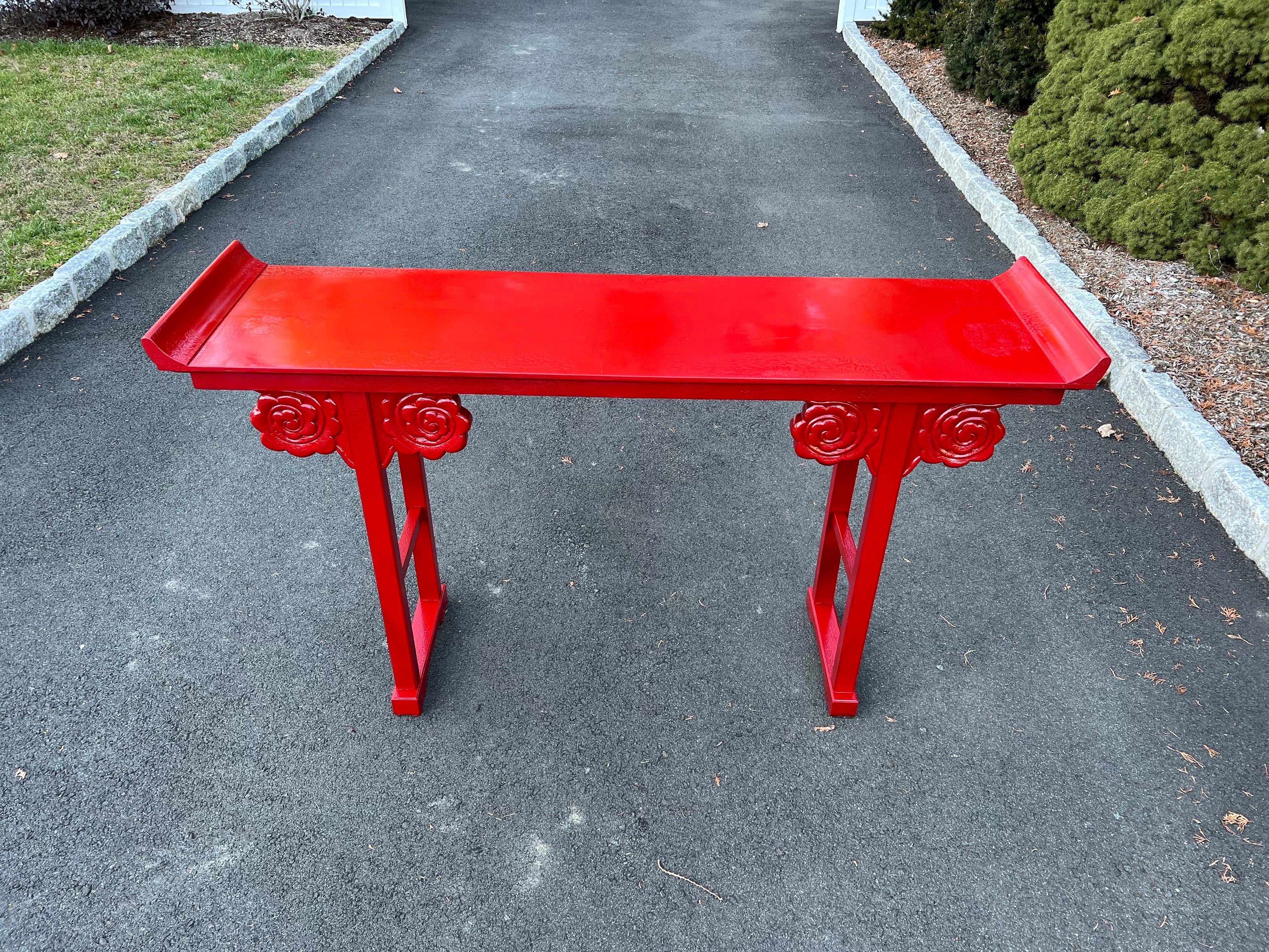 Fire Engine Red Asian console table, Fabulous ,bright piece perfect for lighting up a room.
wonderful curved florette pattern on this traditional altar style table.
