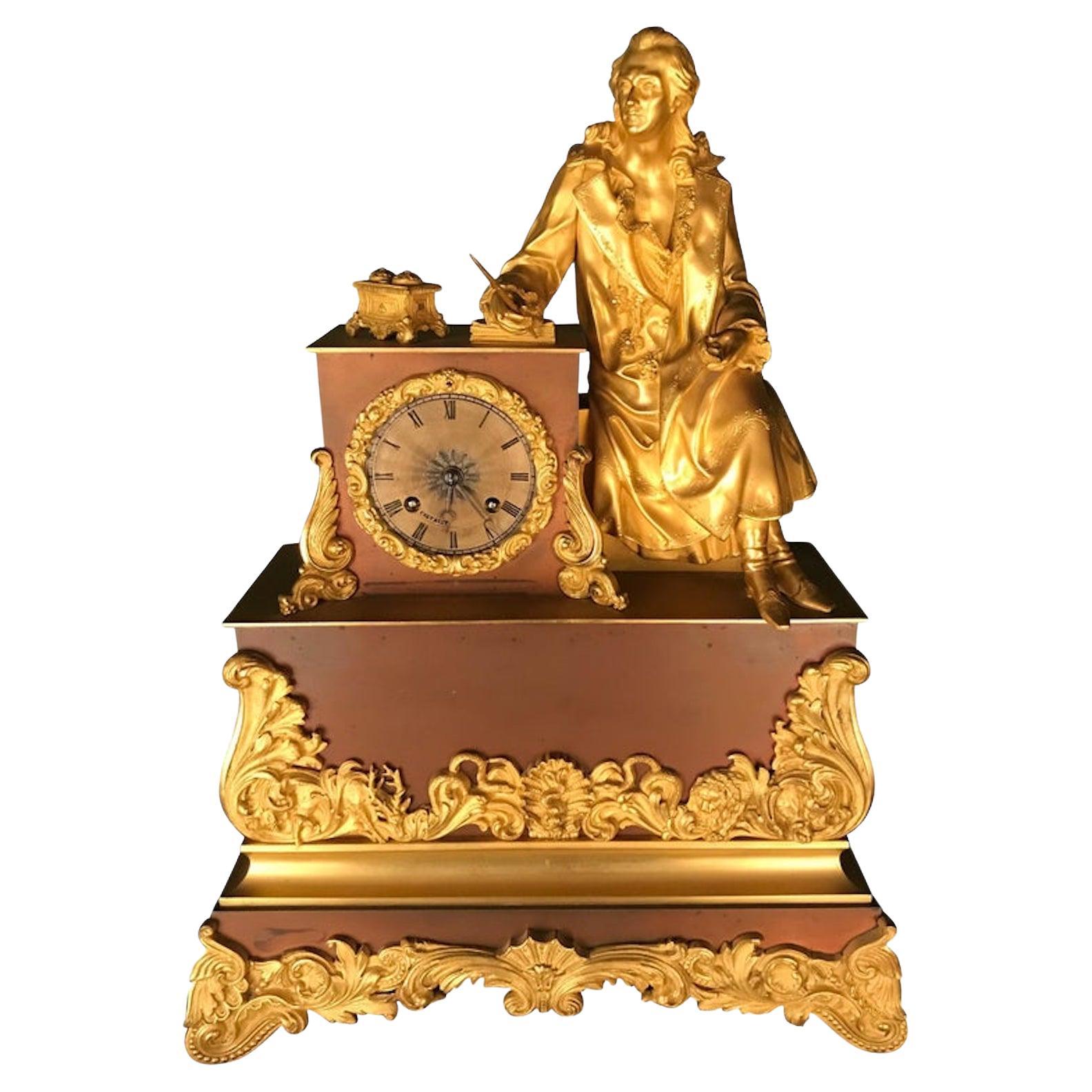 Orologio a pendolo dorato a fuoco 1870 Bronzo Poeta seduto Fine Cherviet