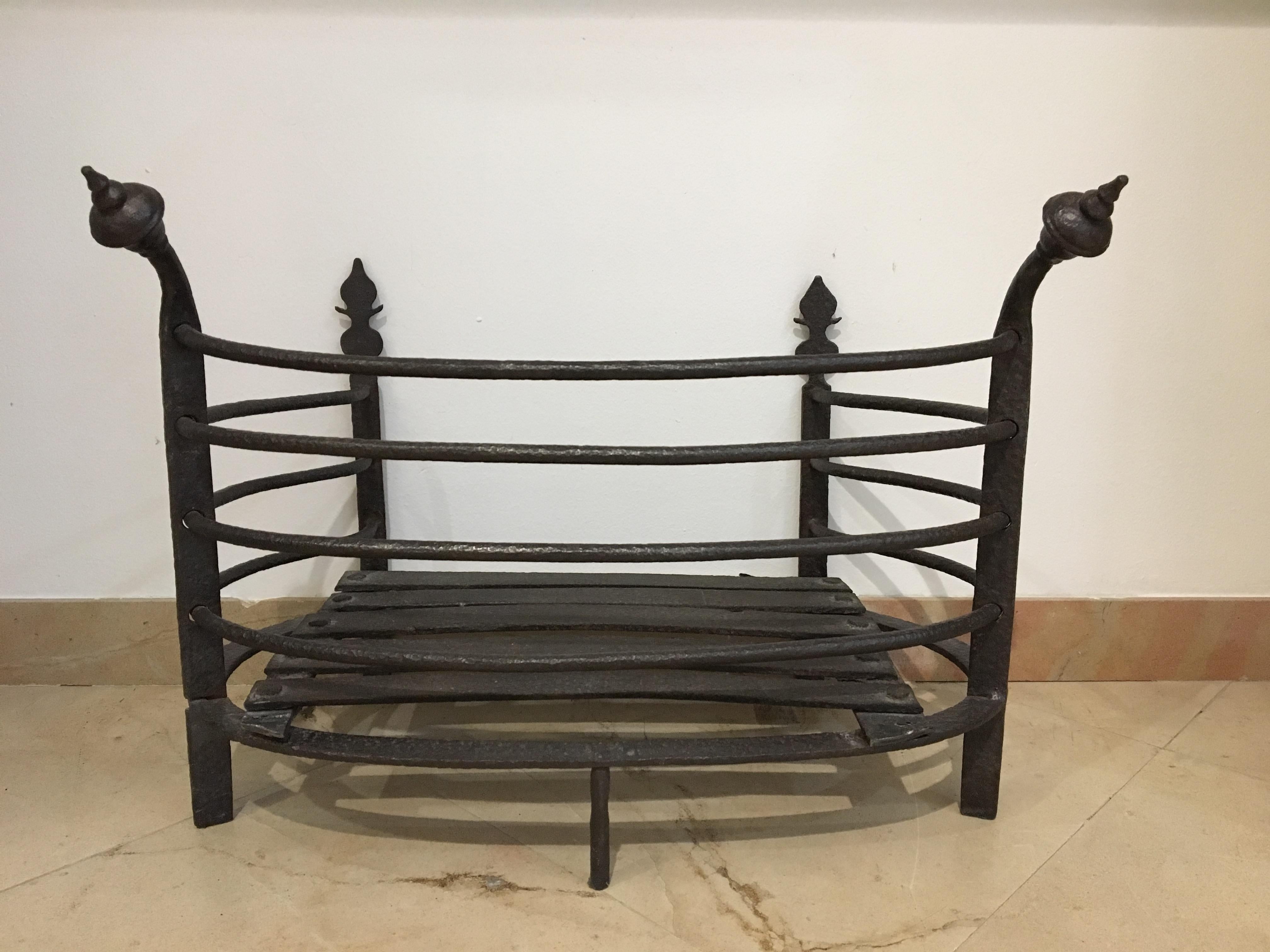 Antique fire grate, fireplace basket

Great curved wrought iron antique firebacket or fire grate.
Perfect size, beautiful condition and great shape.




               