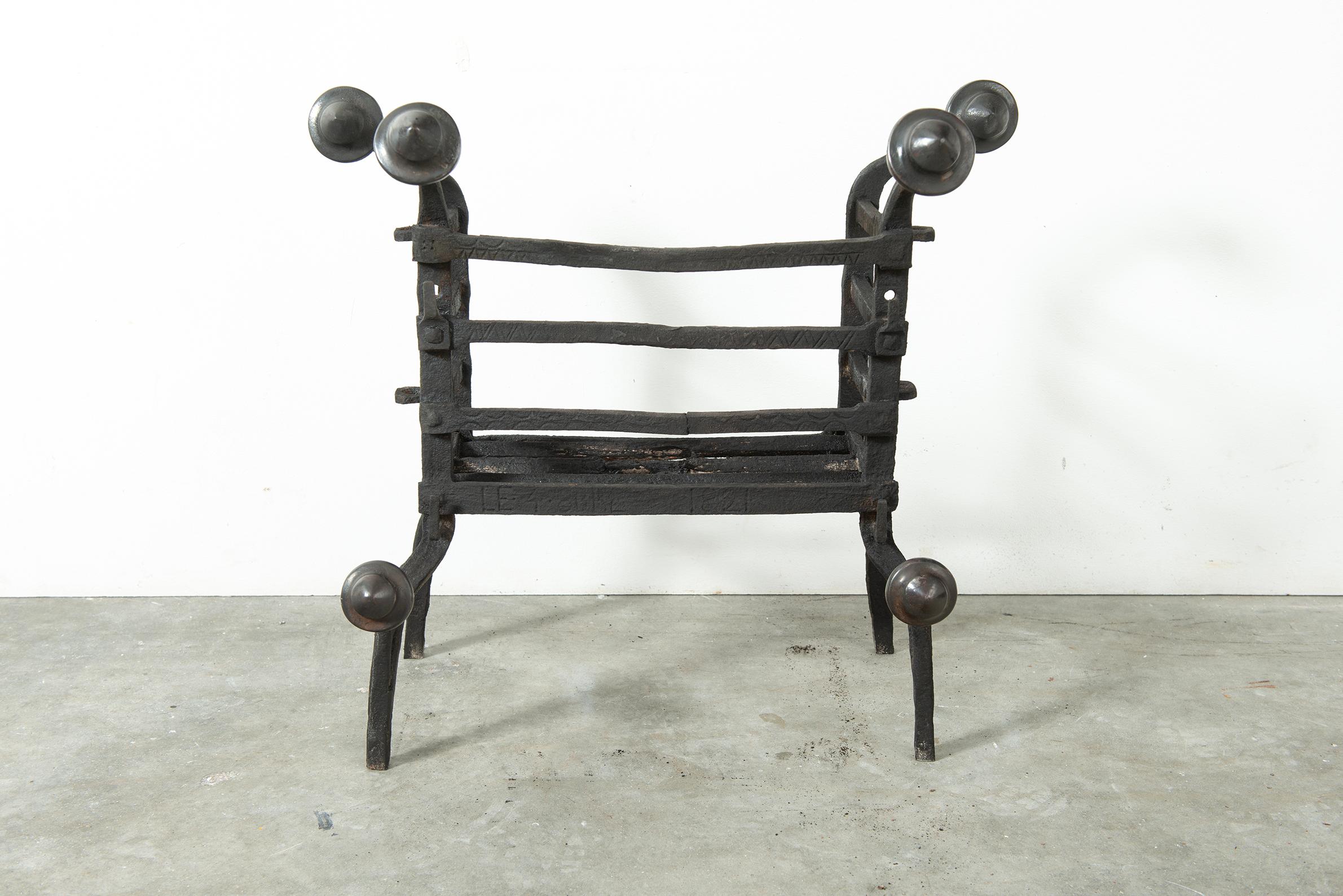 17th century Dutch wrought iron fireplace basket.
Great looking and very decorative piece, tremendous craftsmanship and detailed decoration. 

Great original and usable condition, works great in a real log fire.

Sold by Schermerhorn antique