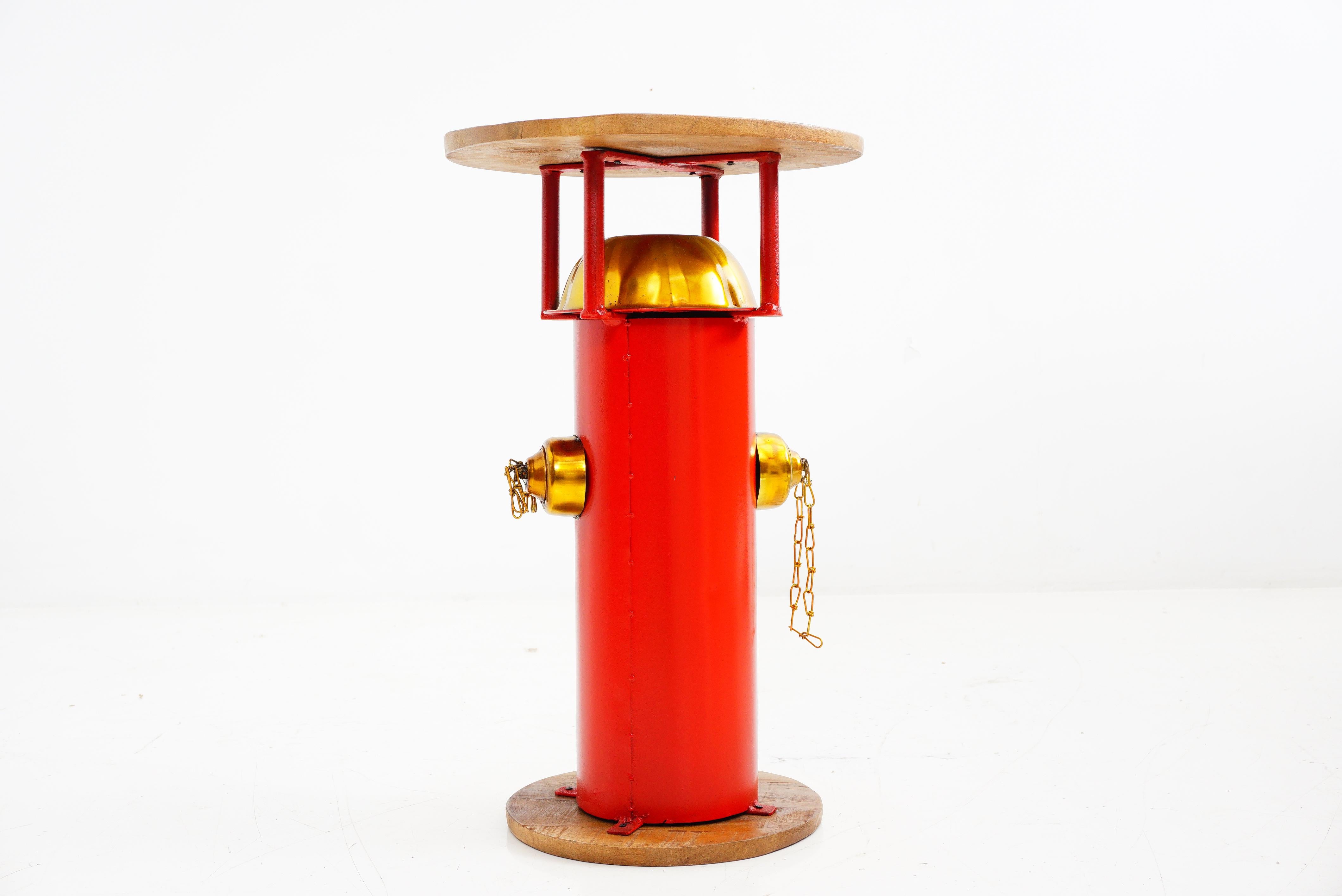This accent table in the shape of a fire hydrant is here to ignite your home with a burst of color and a whole lot of personality. No emergencies, just exceptional style and a touch of whimsy.

- 26.5