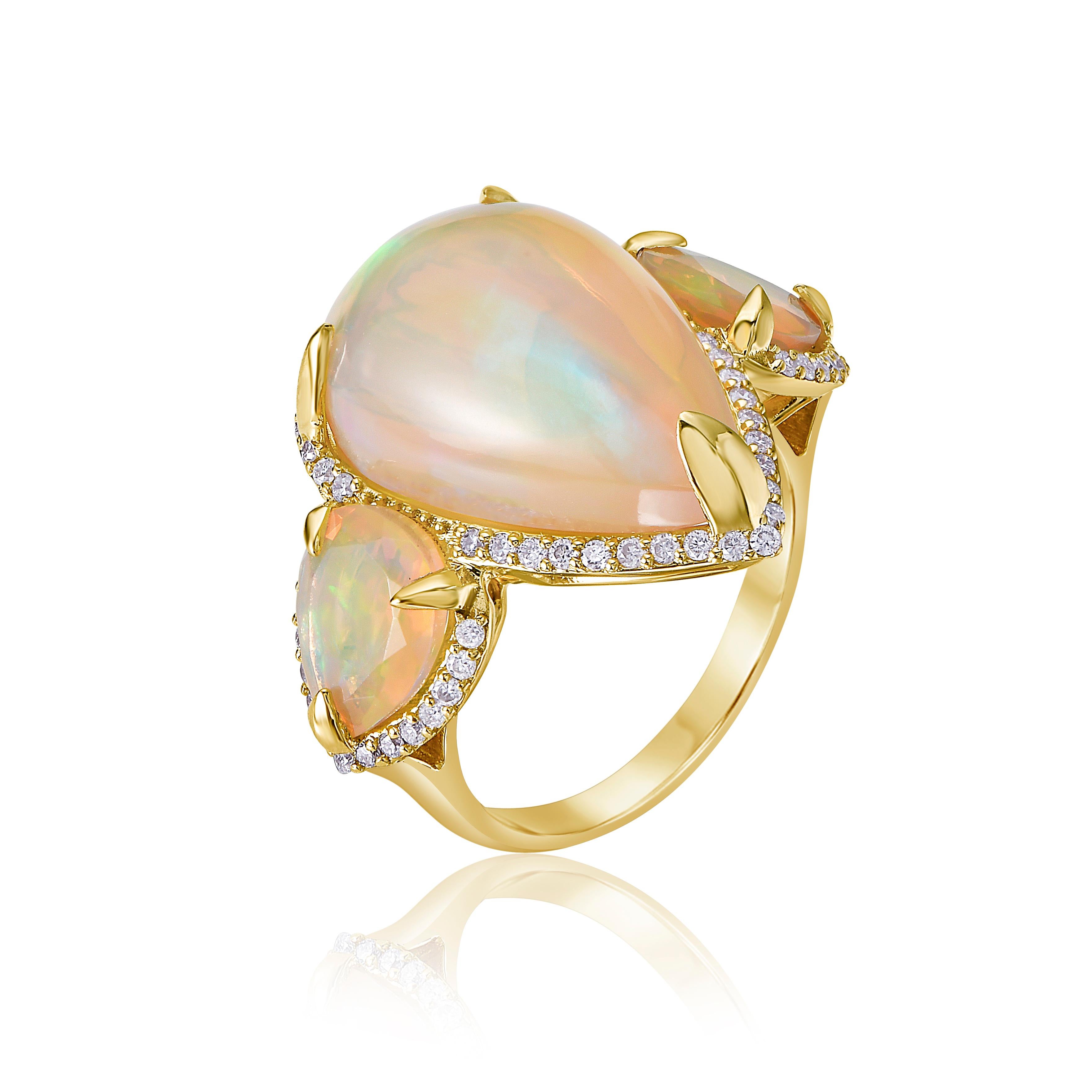 Fire Opal 18k Gold Diamond Unicorn Ring. Handcrafted designer ring in 18k yellow gold with 11.06ct natural fire opals and 0.76ct diamonds. 

A statement of elegance and wisdom, fire opals symbolize passion and creativity. The magical tales of