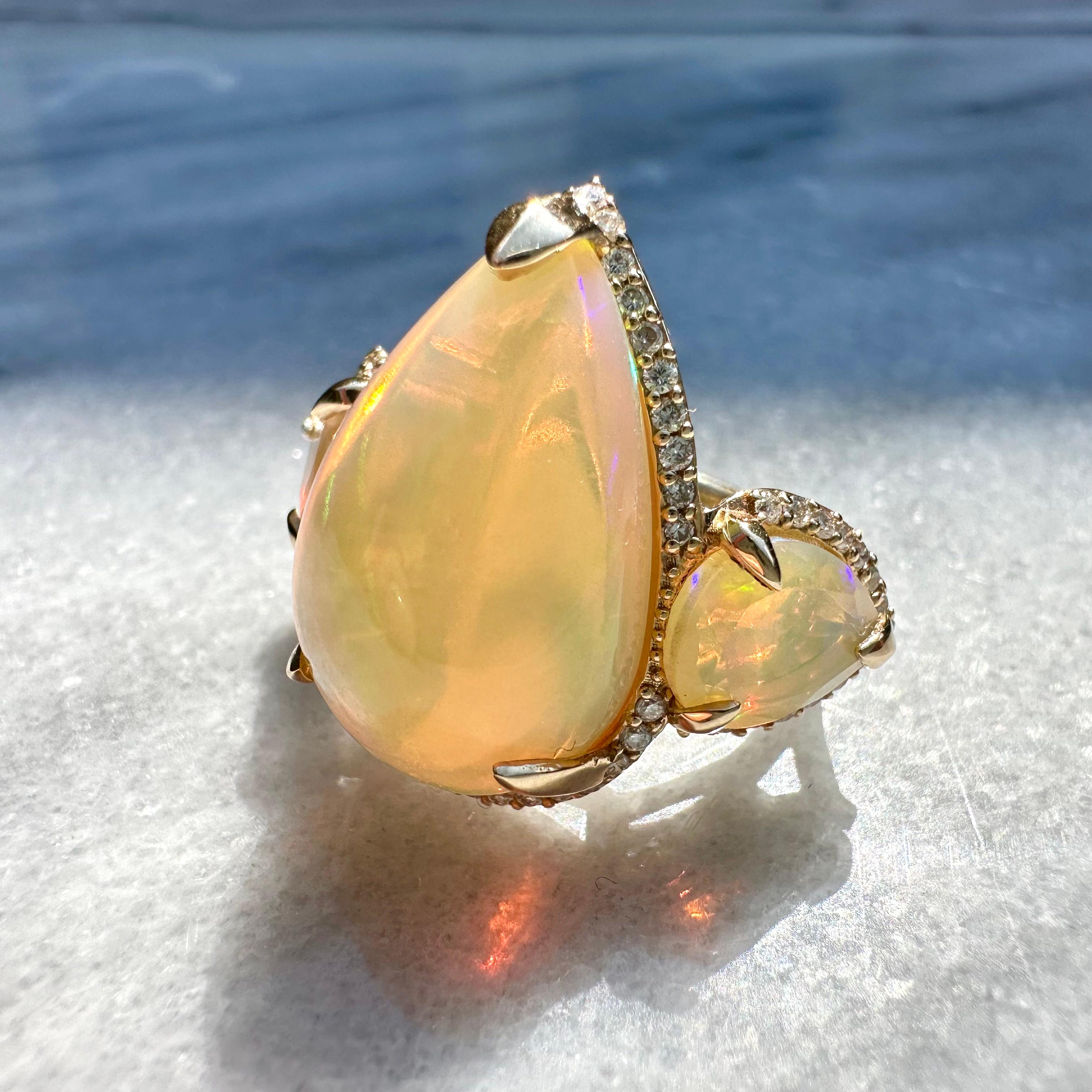 Modern Fire Opal 18k Gold Diamond Unicorn Ring For Sale