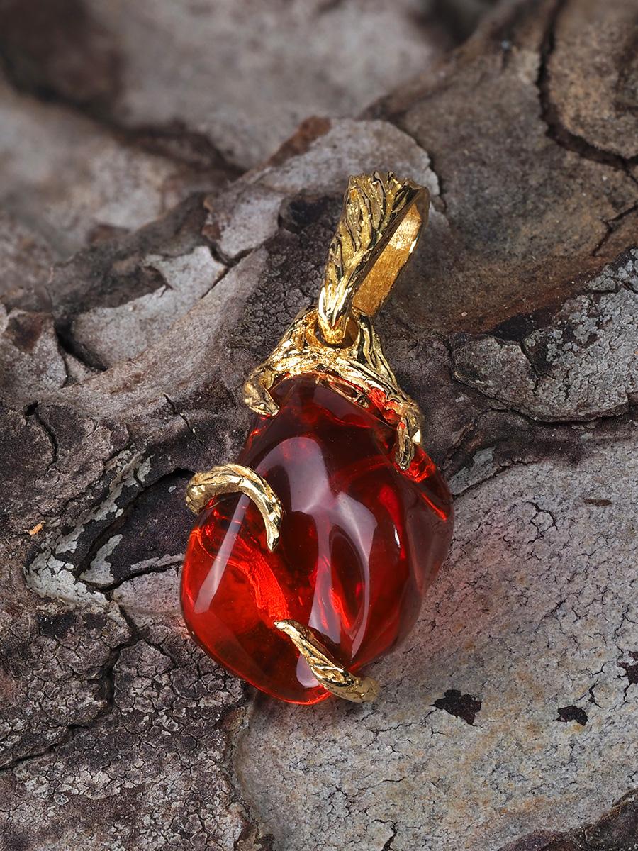 18K yellow gold pendant with natural fire opal

opal origin - Mexico

stone measurements - 0.39 x 0.59 in / 10 х 15 mm

gemstone weight - 2.78 carats

pendant height - 0.94 in / 24 mm

pendant weight - 1.66 grams

Roots collection